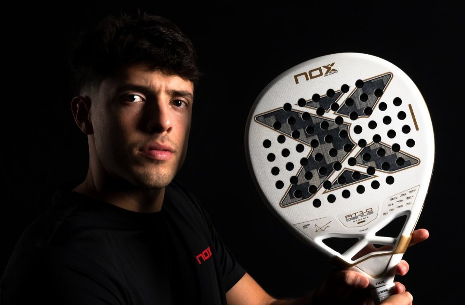 person wearing grey knit sweater