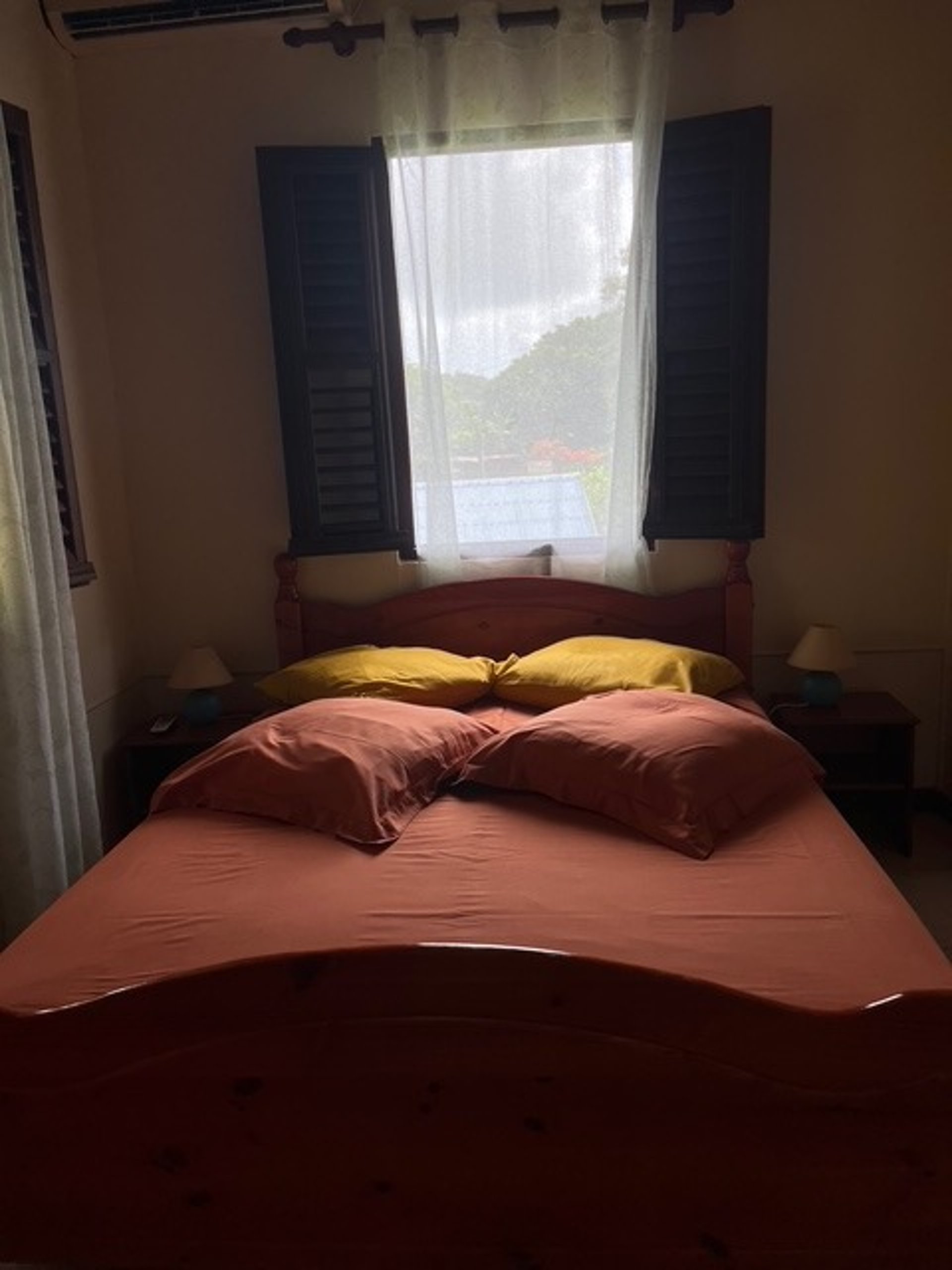 an abstract photo of a curved building with a blue sky in the background