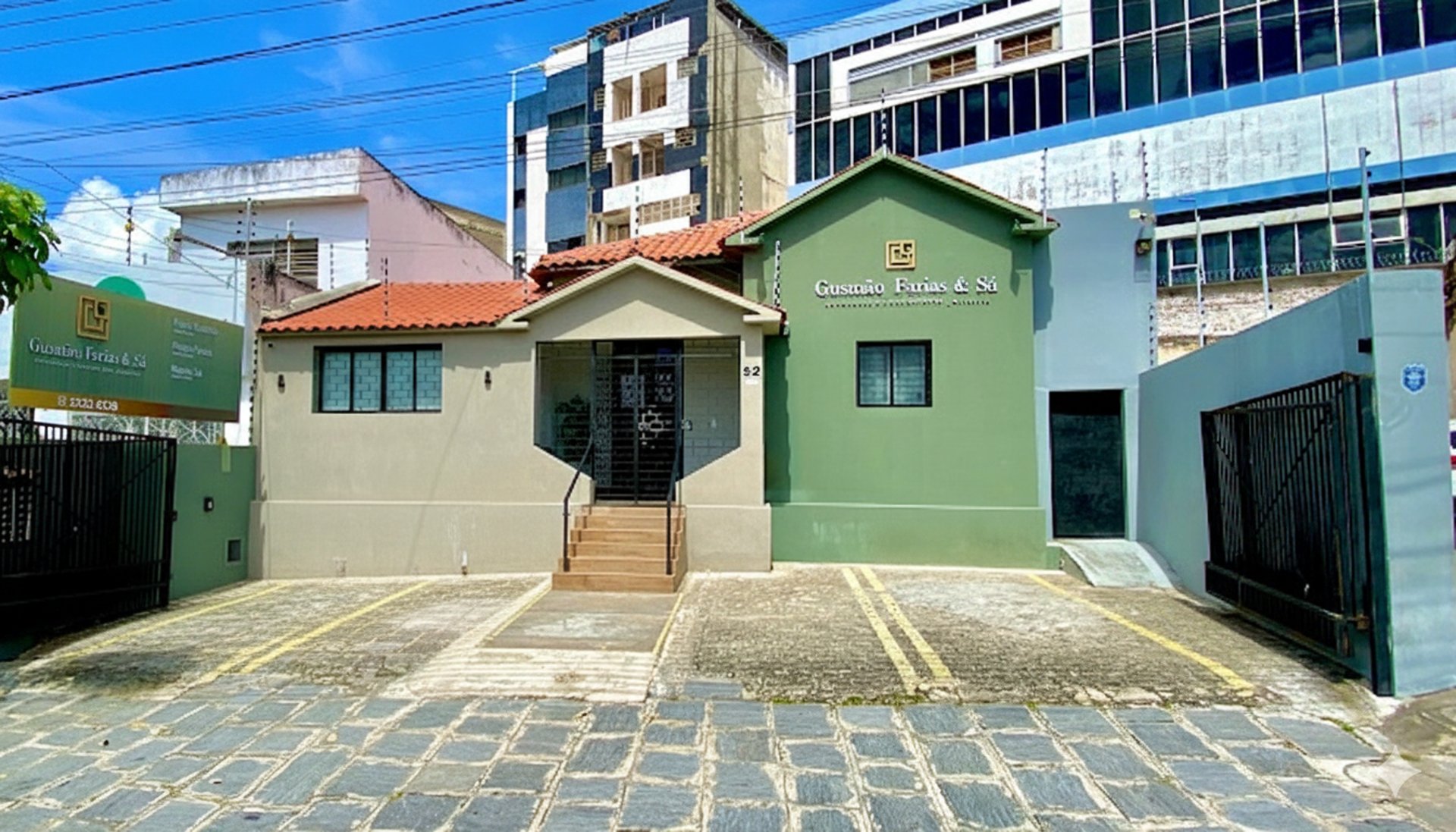 woman in gold dress holding sword figurine