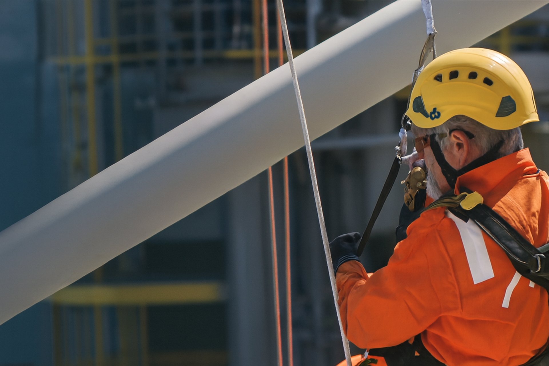 a factory filled with lots of orange machines
