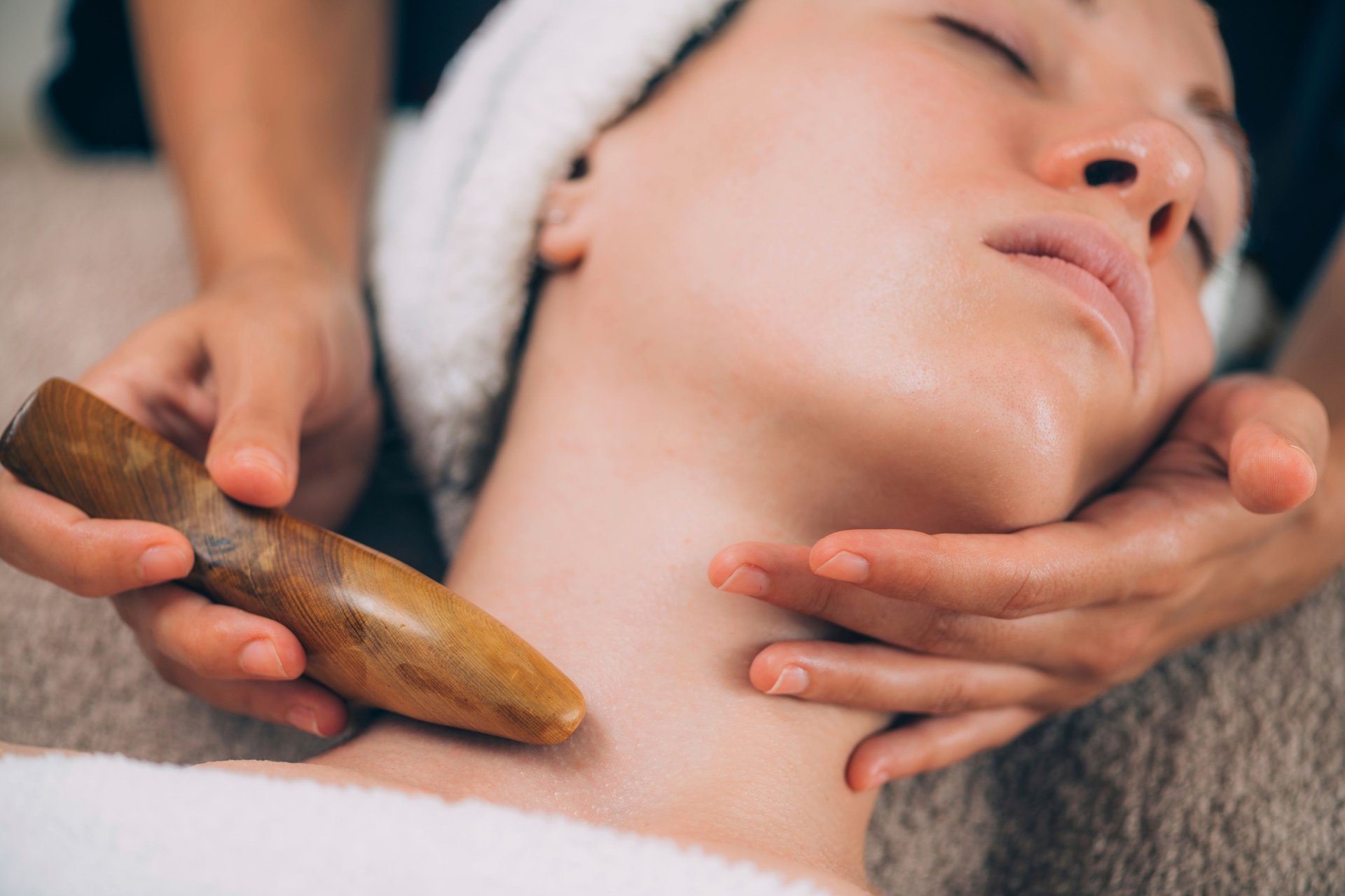 an abstract photo of a curved building with a blue sky in the background