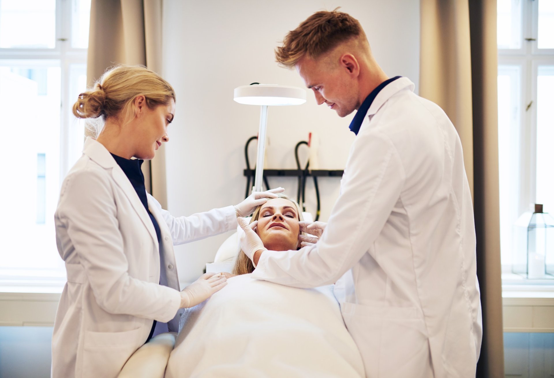 black and brown leather padded tub sofa