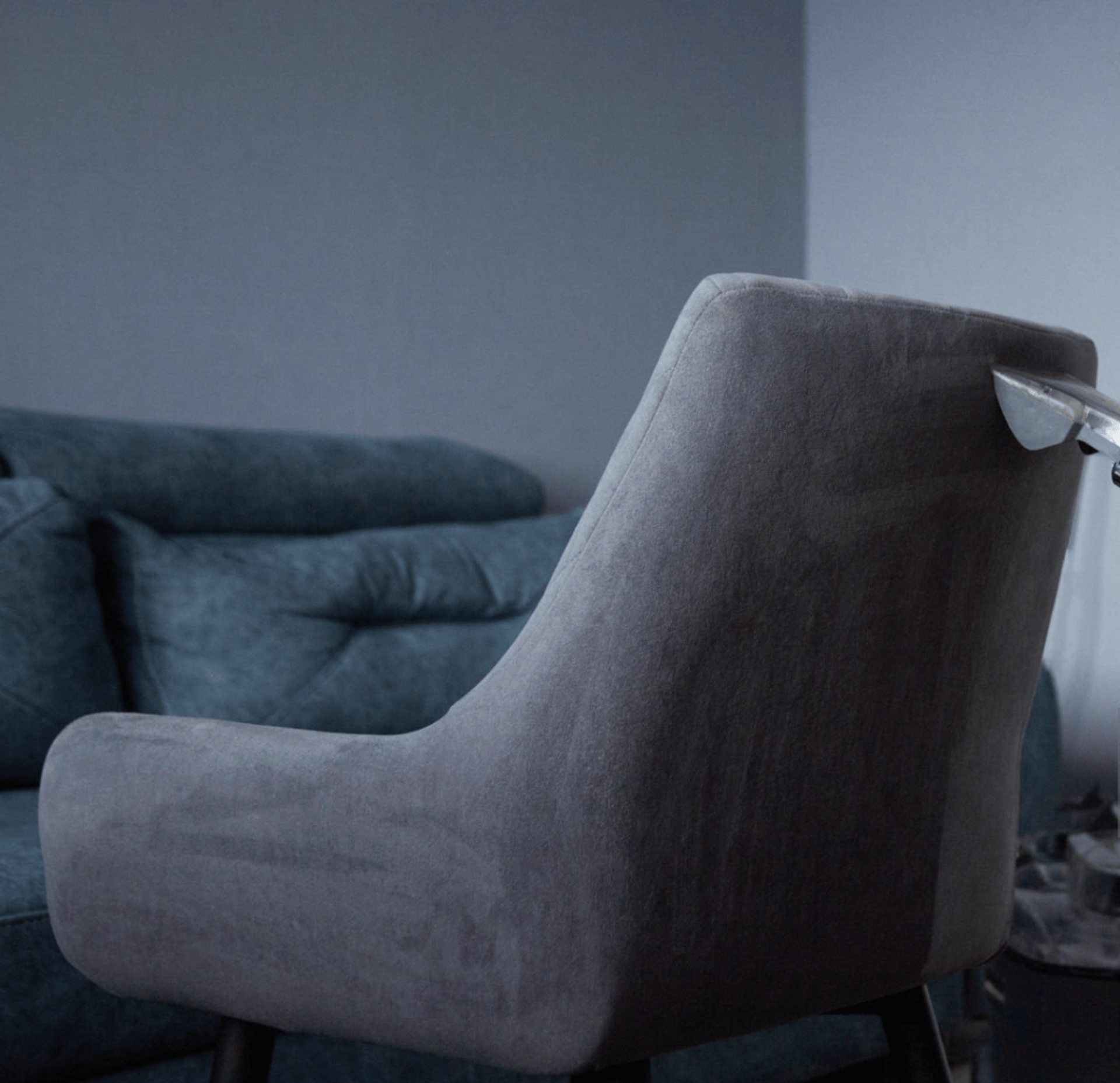 an abstract photo of a curved building with a blue sky in the background