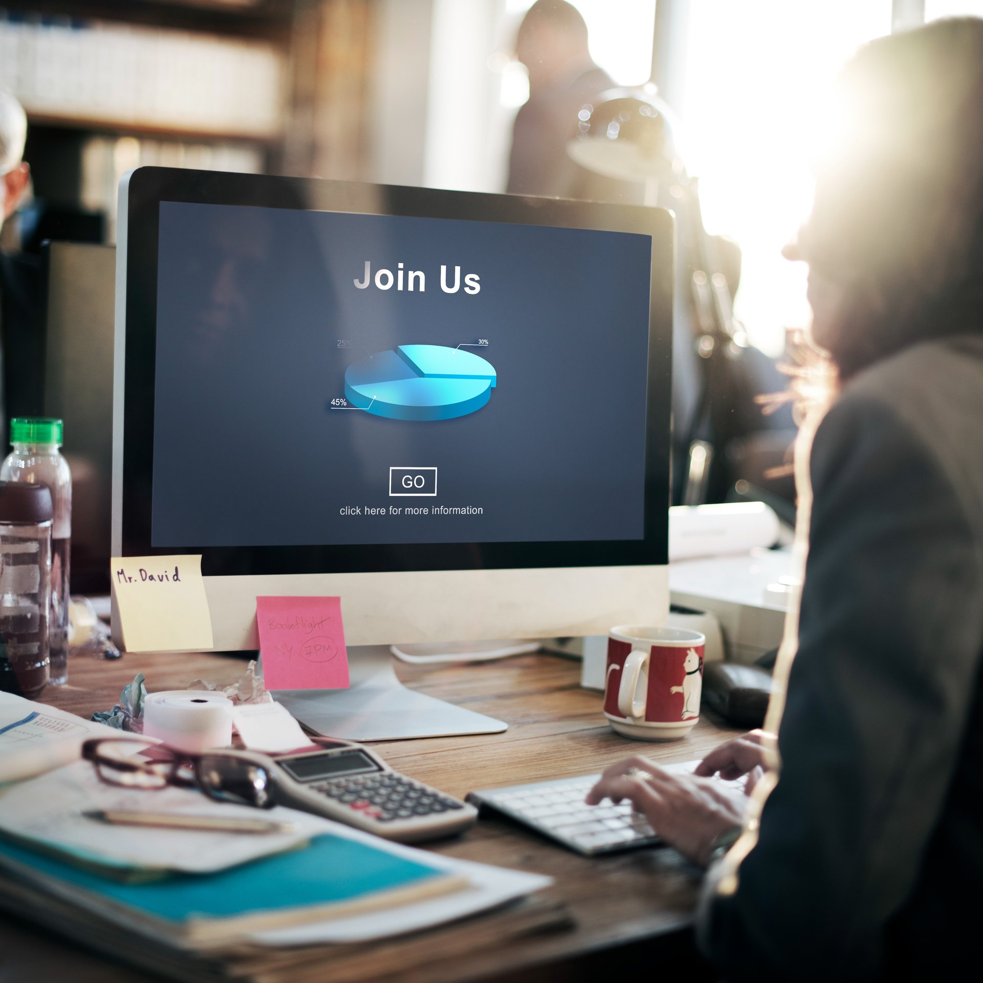 woman in black tank top and black leggings doing yoga