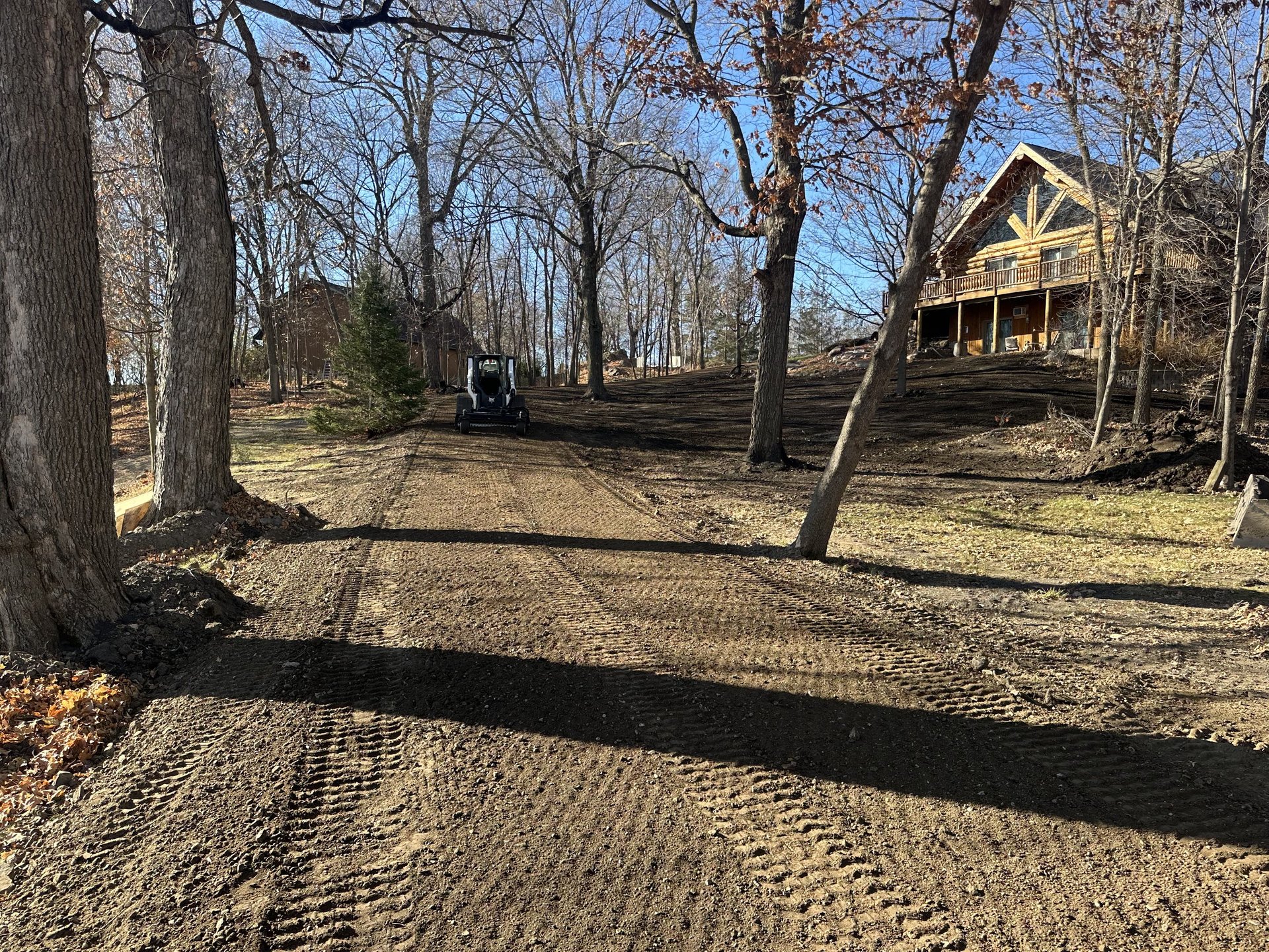 finish dirt grading in residential backyard
