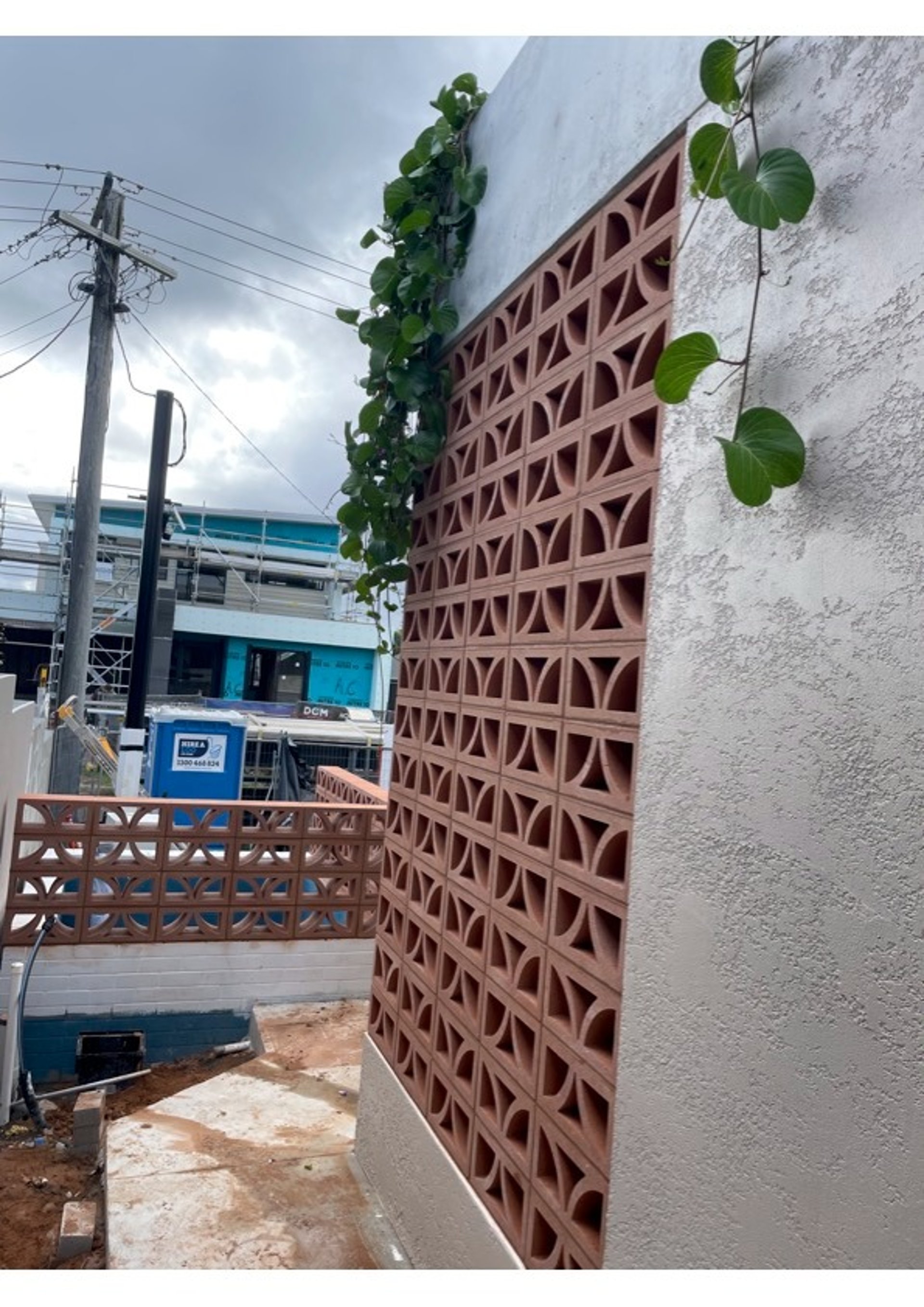 woman wearing yellow long-sleeved dress under white clouds and blue sky during daytime