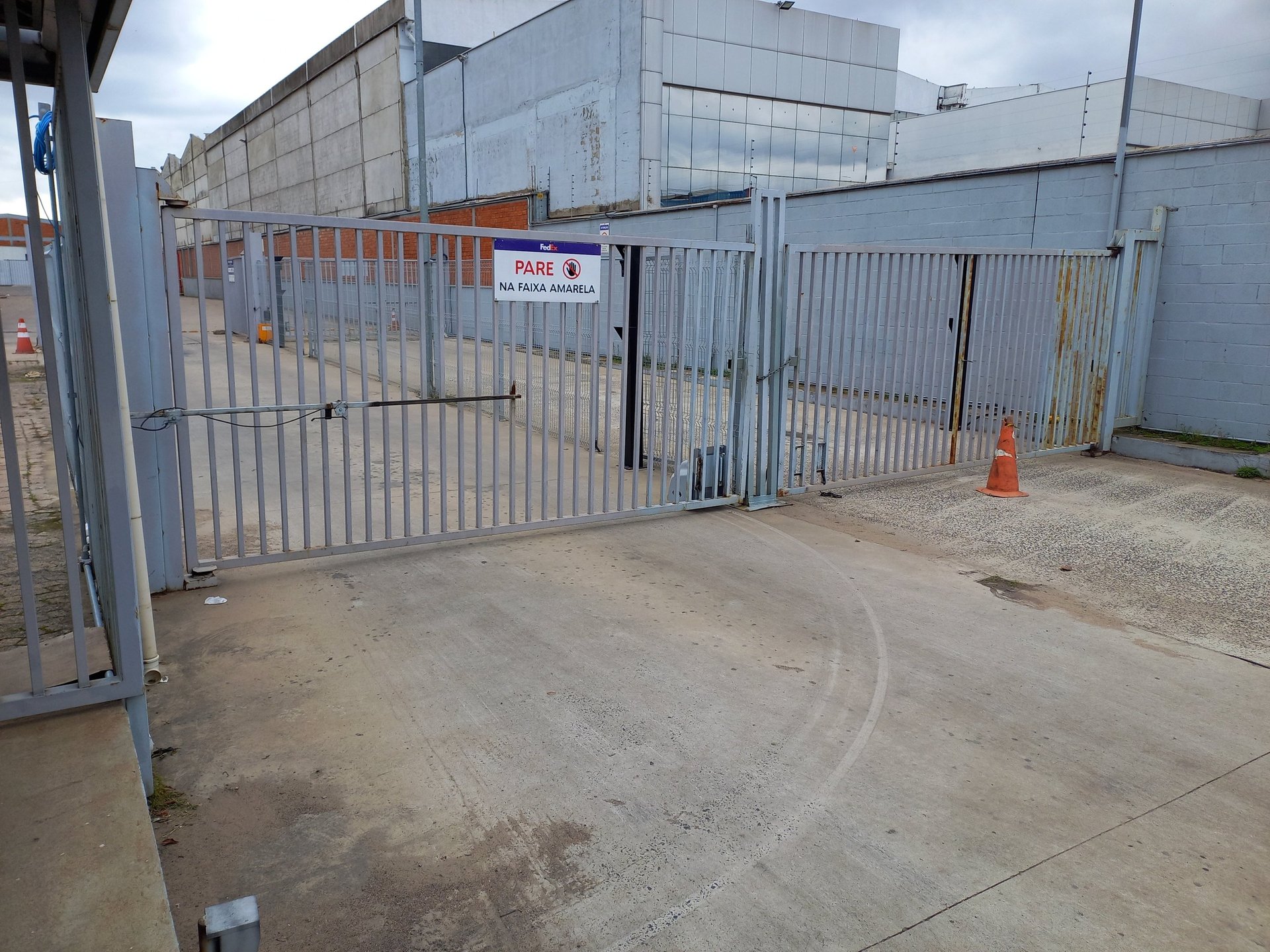 woman wearing yellow long-sleeved dress under white clouds and blue sky during daytime