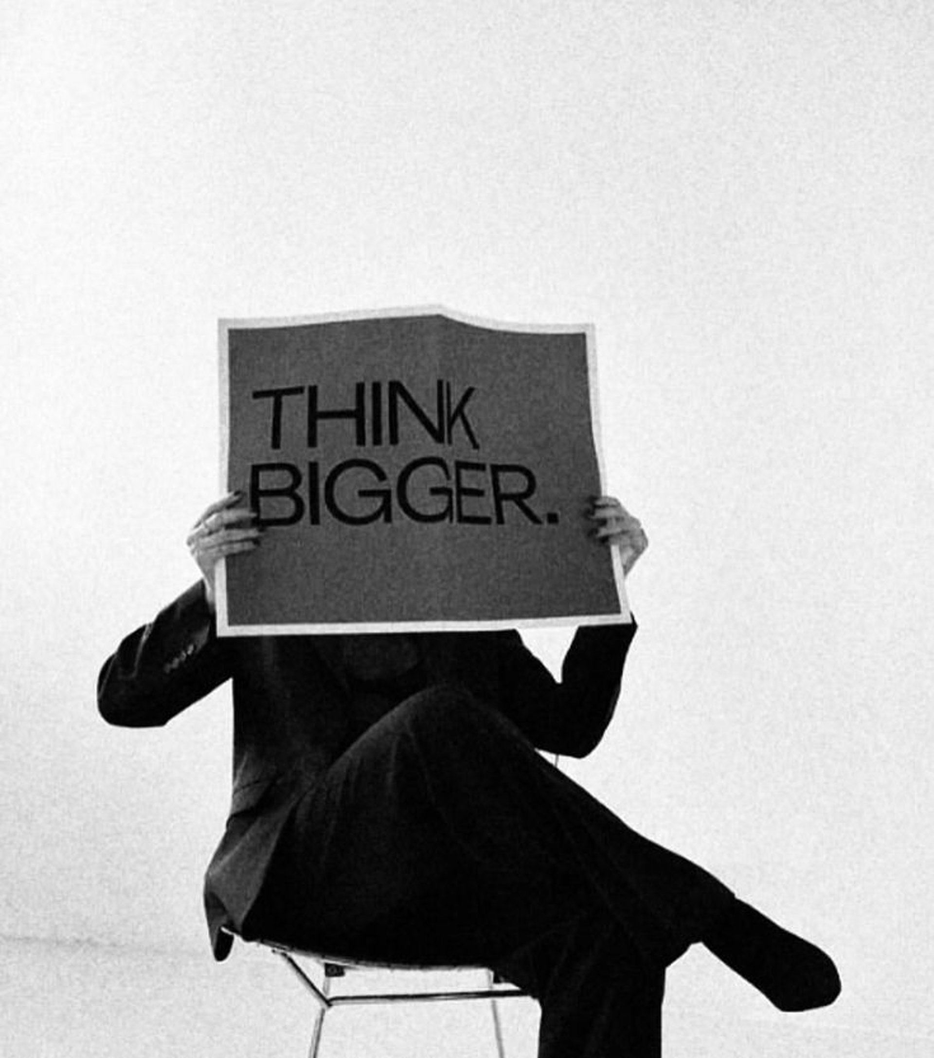 woman wearing yellow long-sleeved dress under white clouds and blue sky during daytime
