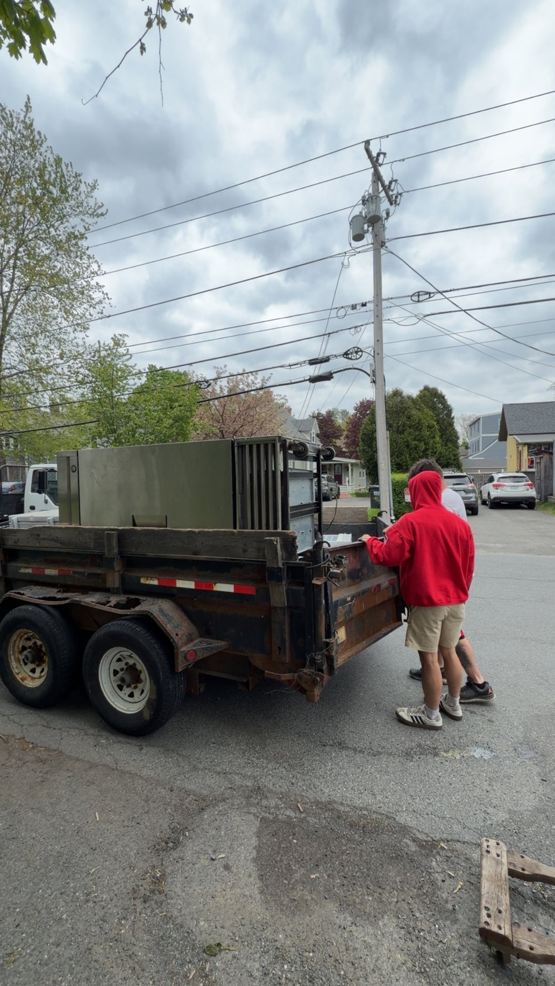 Junk hauling truck loaded during Suffield cleanout project