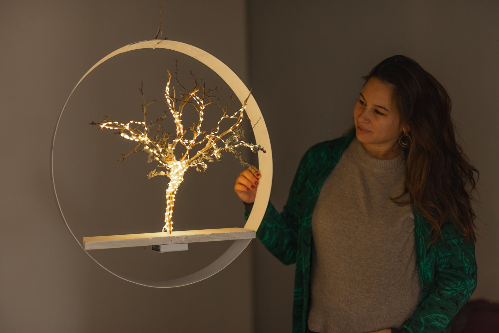 woman holding dried flower