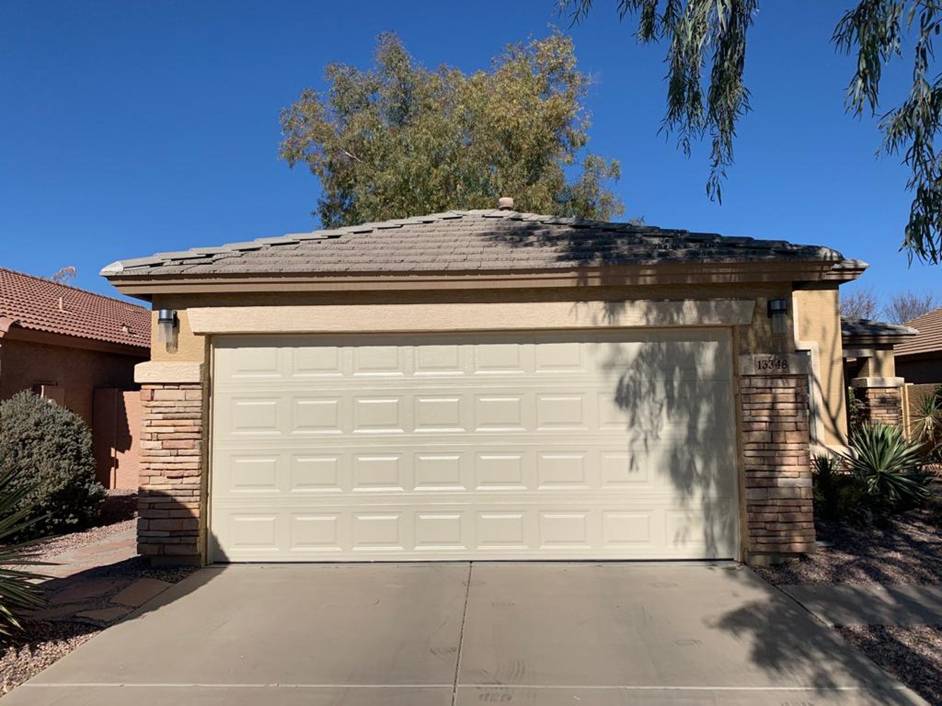 black and brown leather padded tub sofa