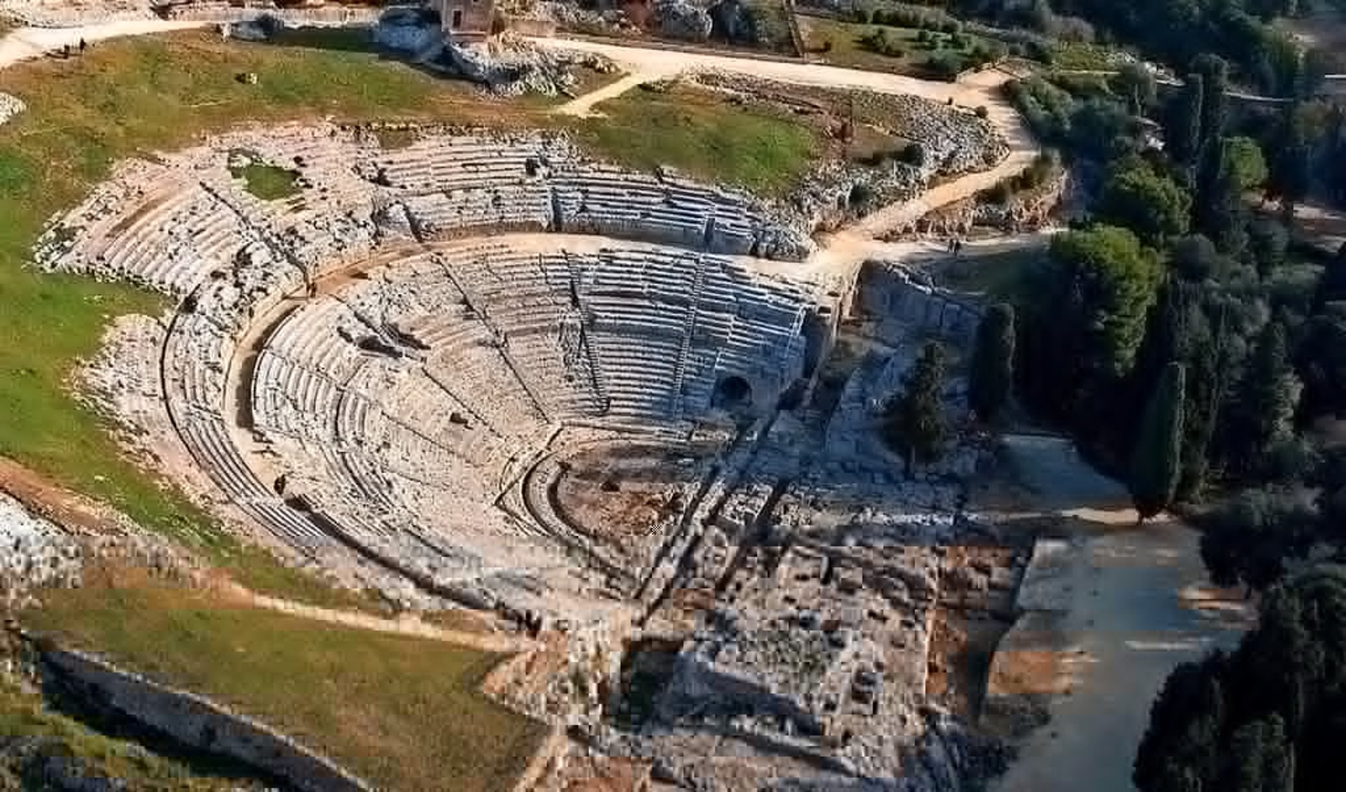 woman wearing yellow long-sleeved dress under white clouds and blue sky during daytime