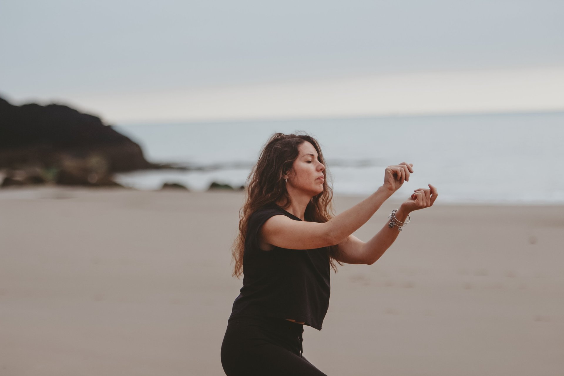 an abstract photo of a curved building with a blue sky in the background