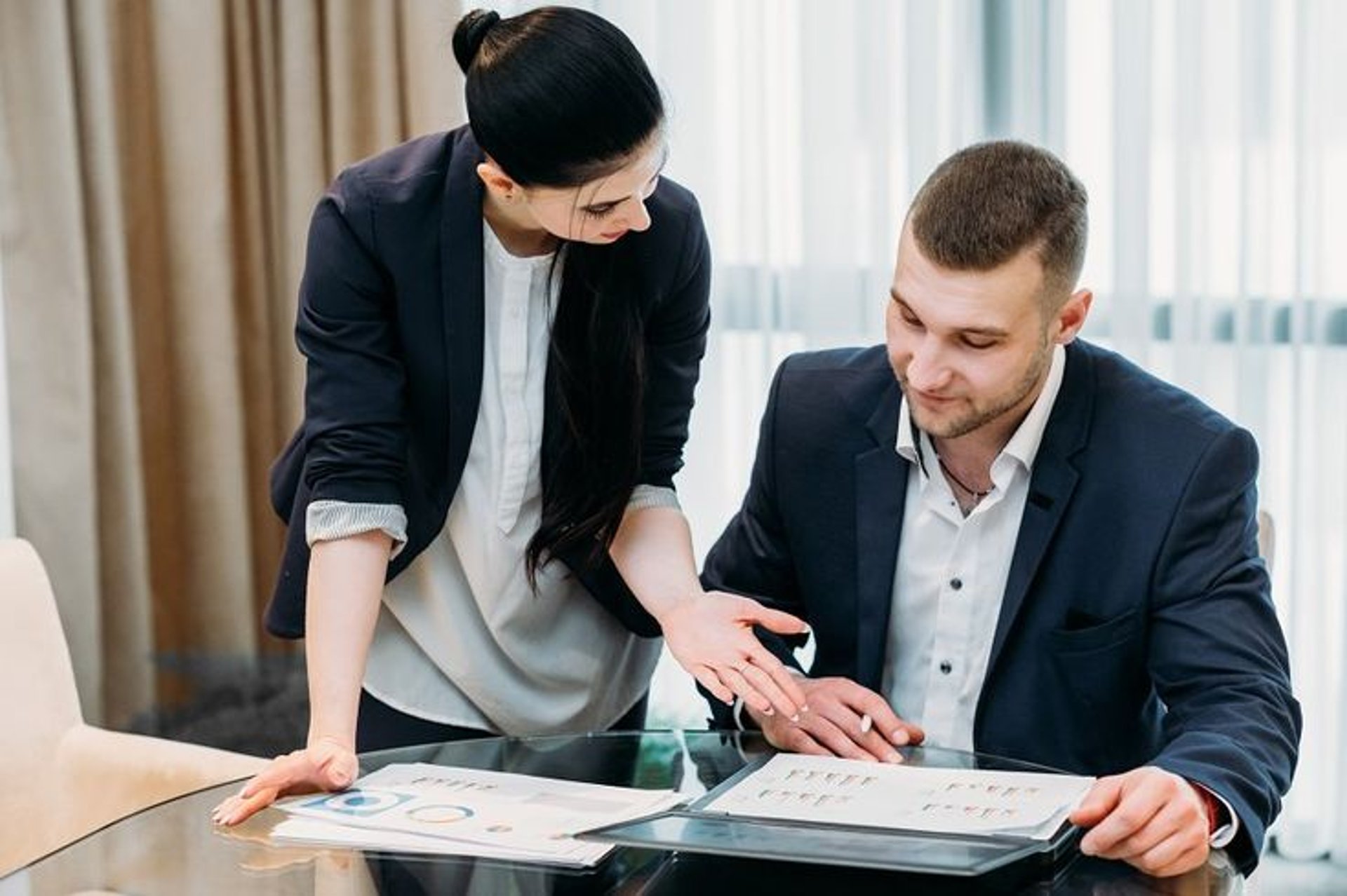 woman wearing yellow long-sleeved dress under white clouds and blue sky during daytime