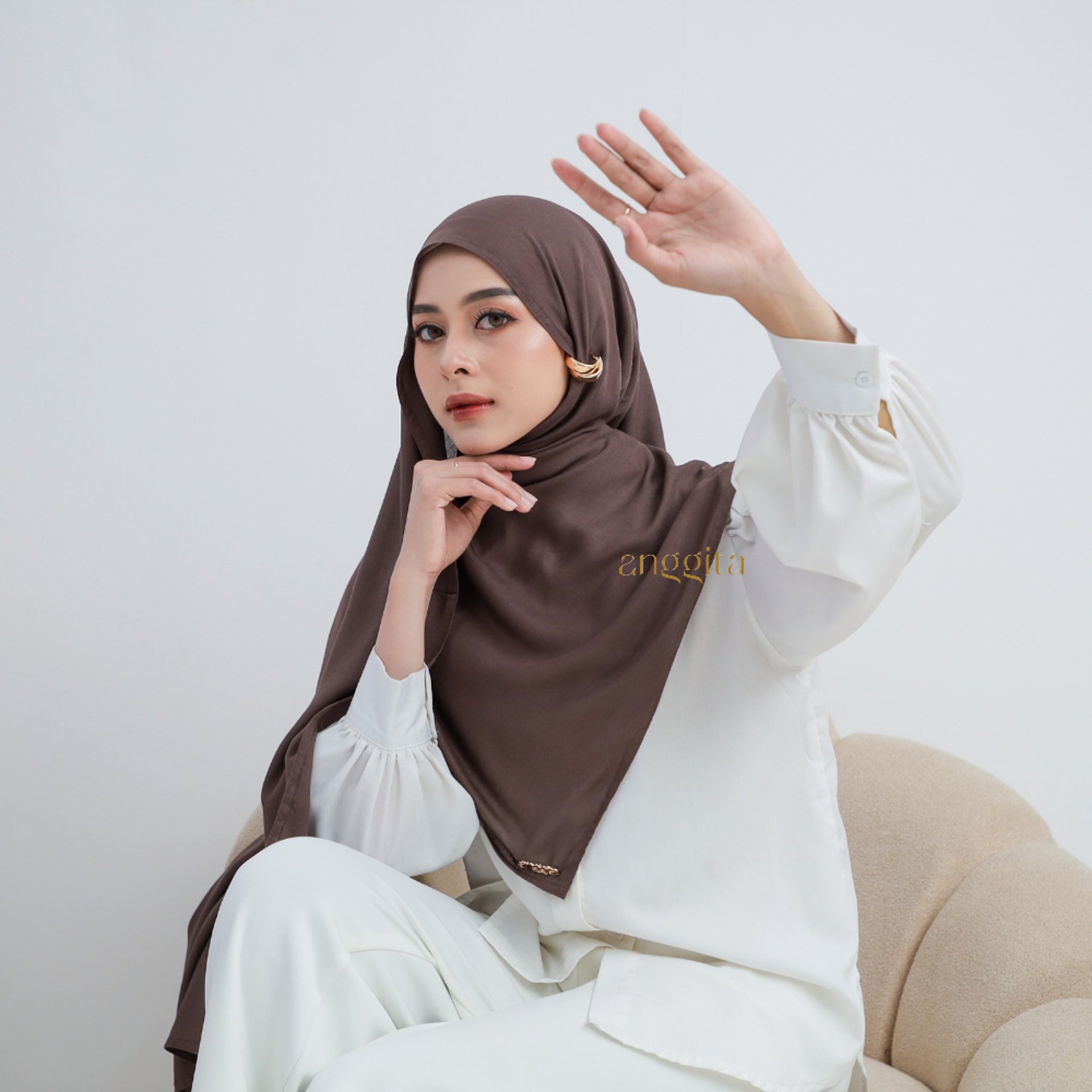 an abstract photo of a curved building with a blue sky in the background