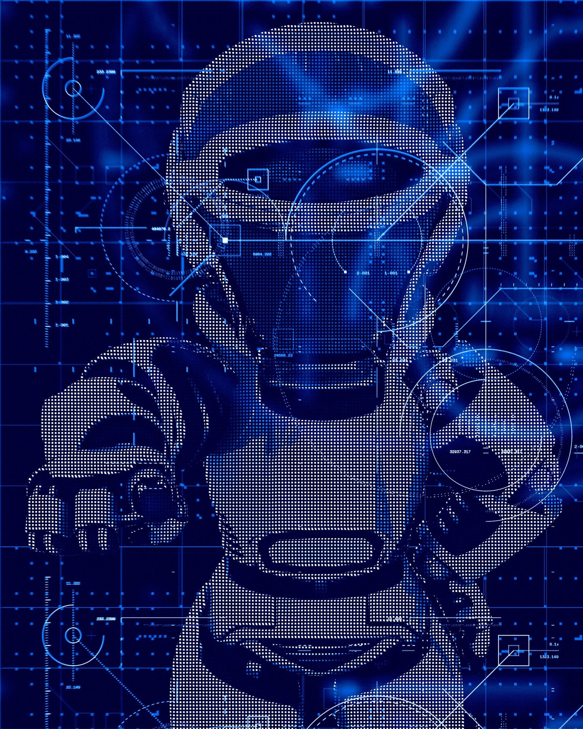 a group of white robots sitting on top of laptops