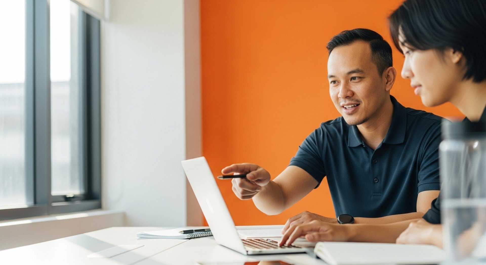 an abstract photo of a curved building with a blue sky in the background