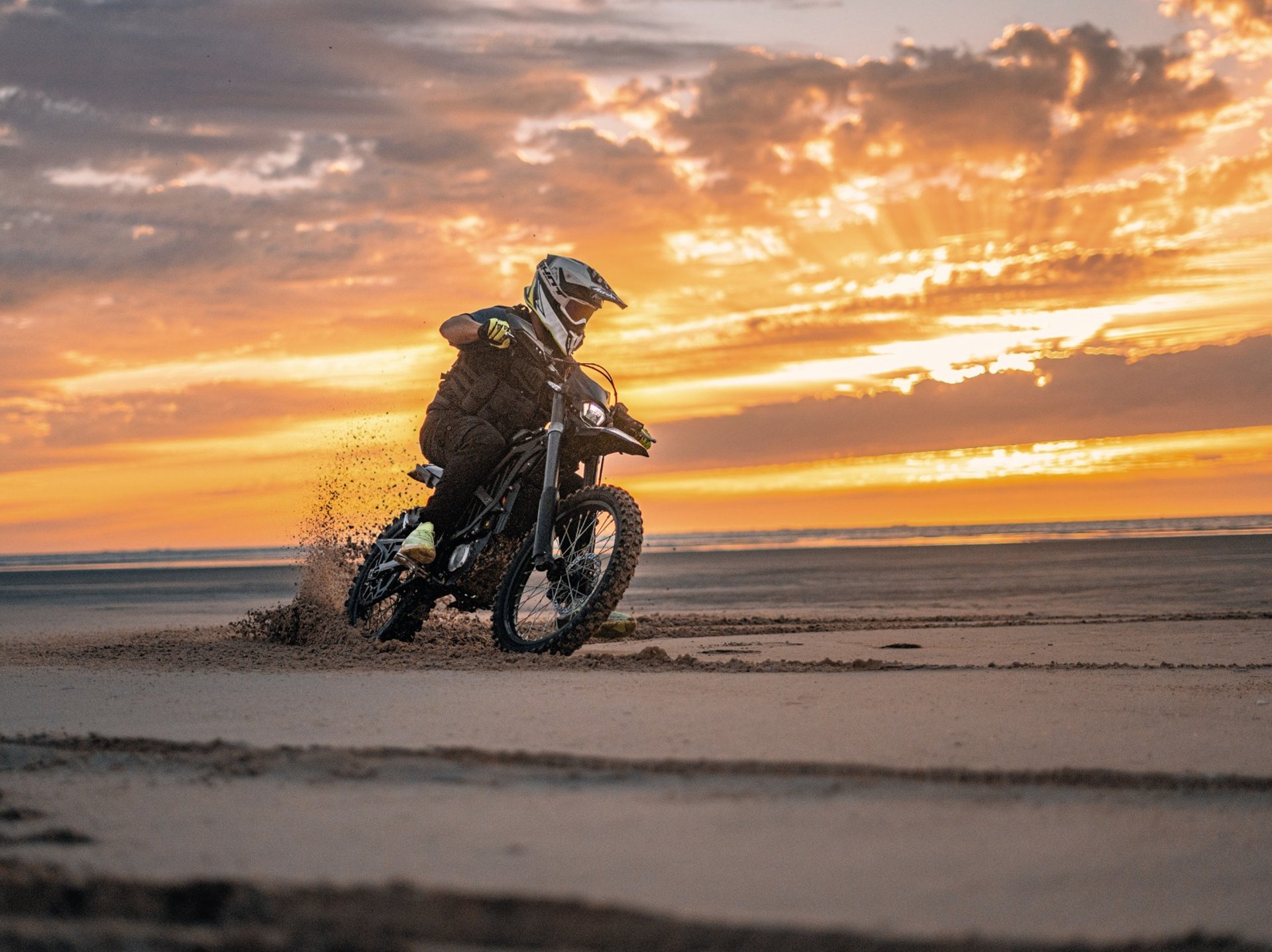 white and brown concrete building near green grass field during daytime