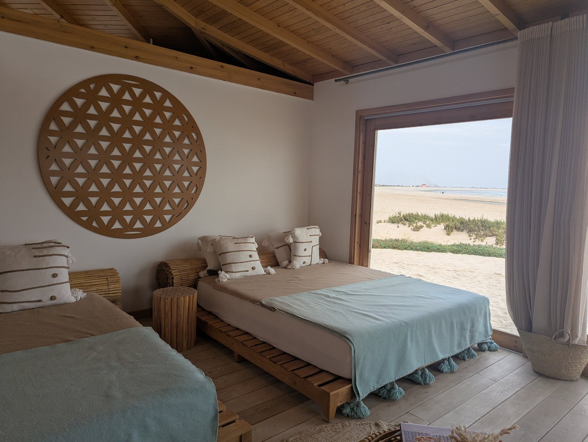 white and brown concrete building near green grass field during daytime