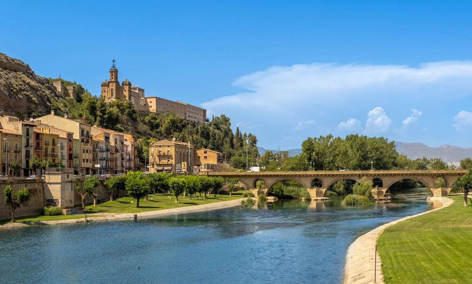 black and brown leather padded tub sofa