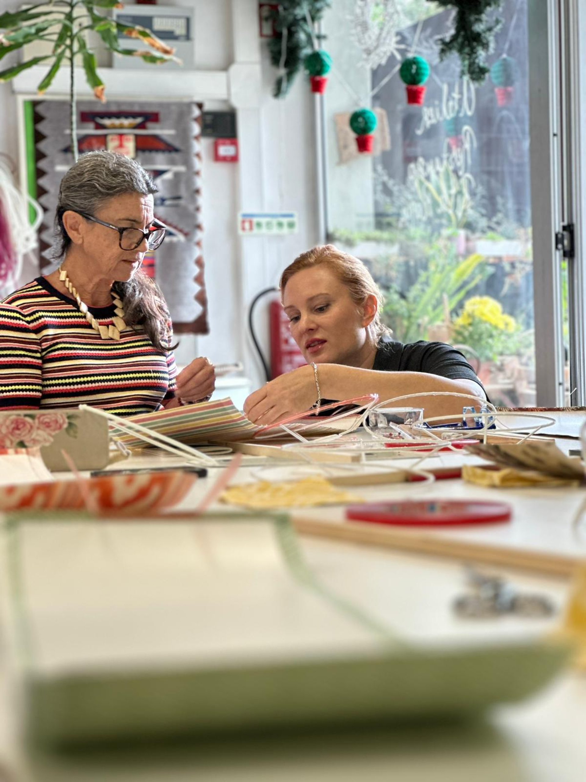 an abstract photo of a curved building with a blue sky in the background