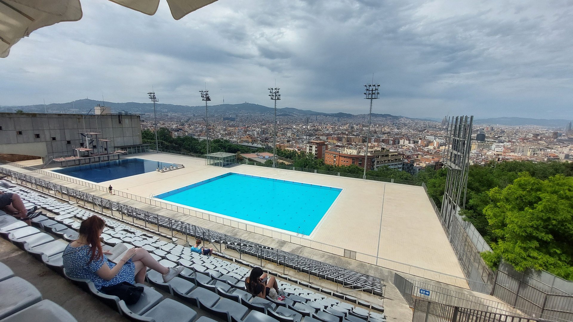 a large body of water with a city in the background