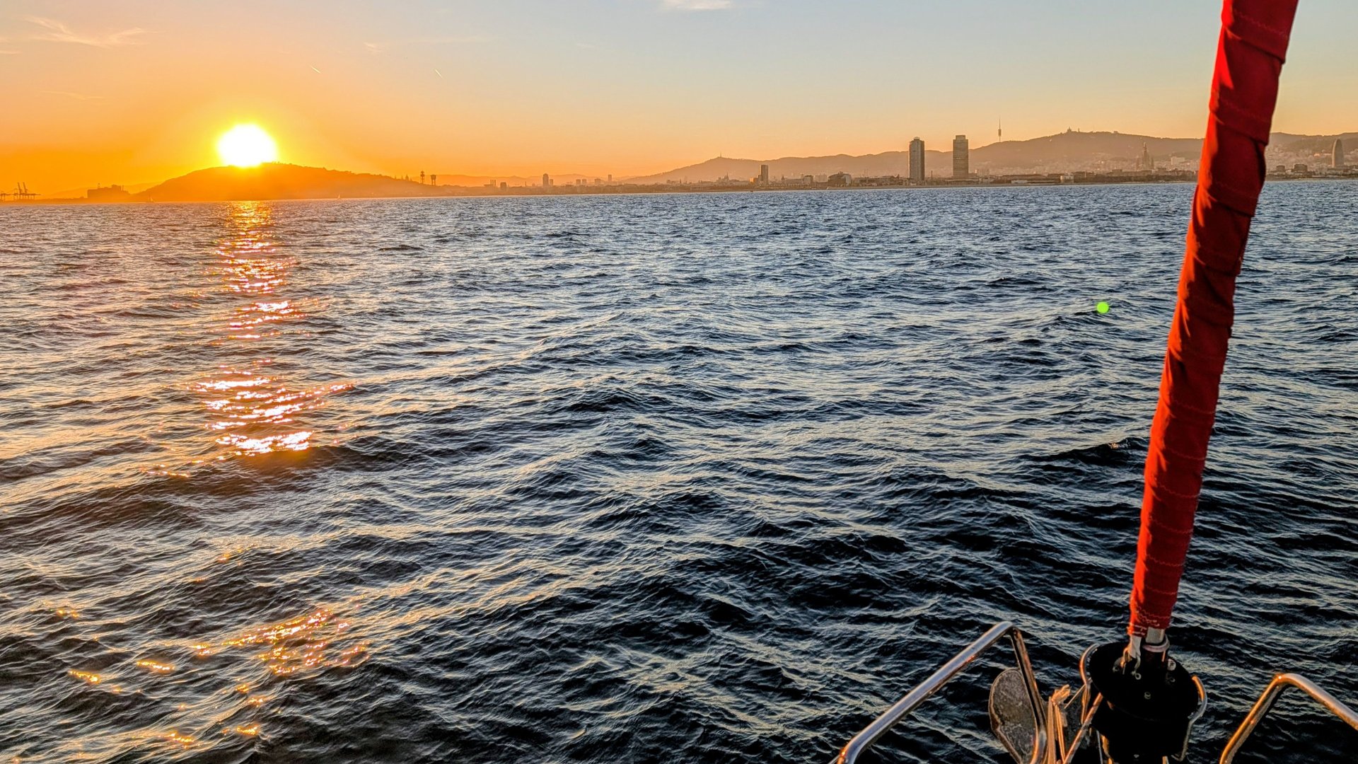an abstract photo of a curved building with a blue sky in the background