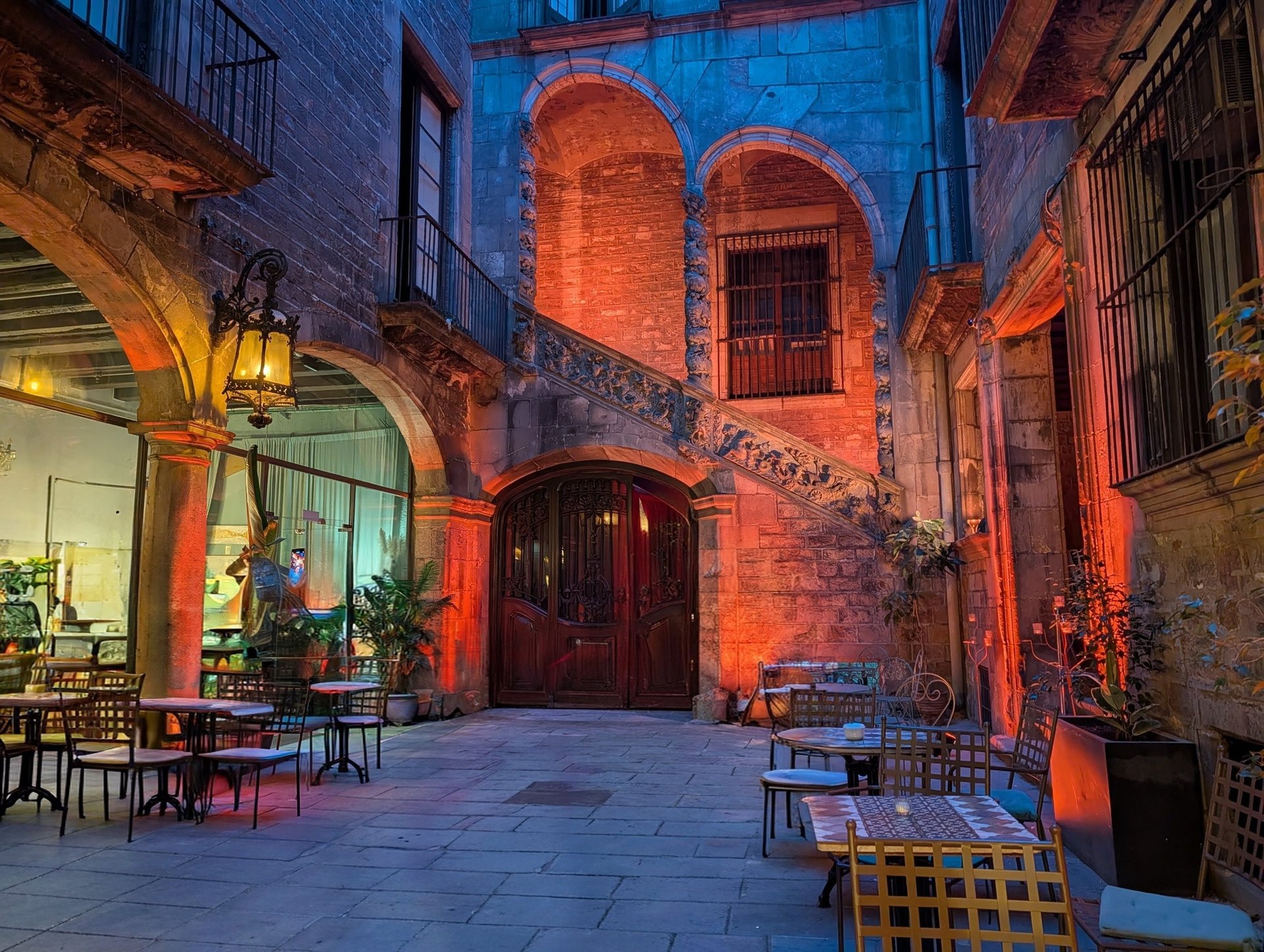 an abstract photo of a curved building with a blue sky in the background