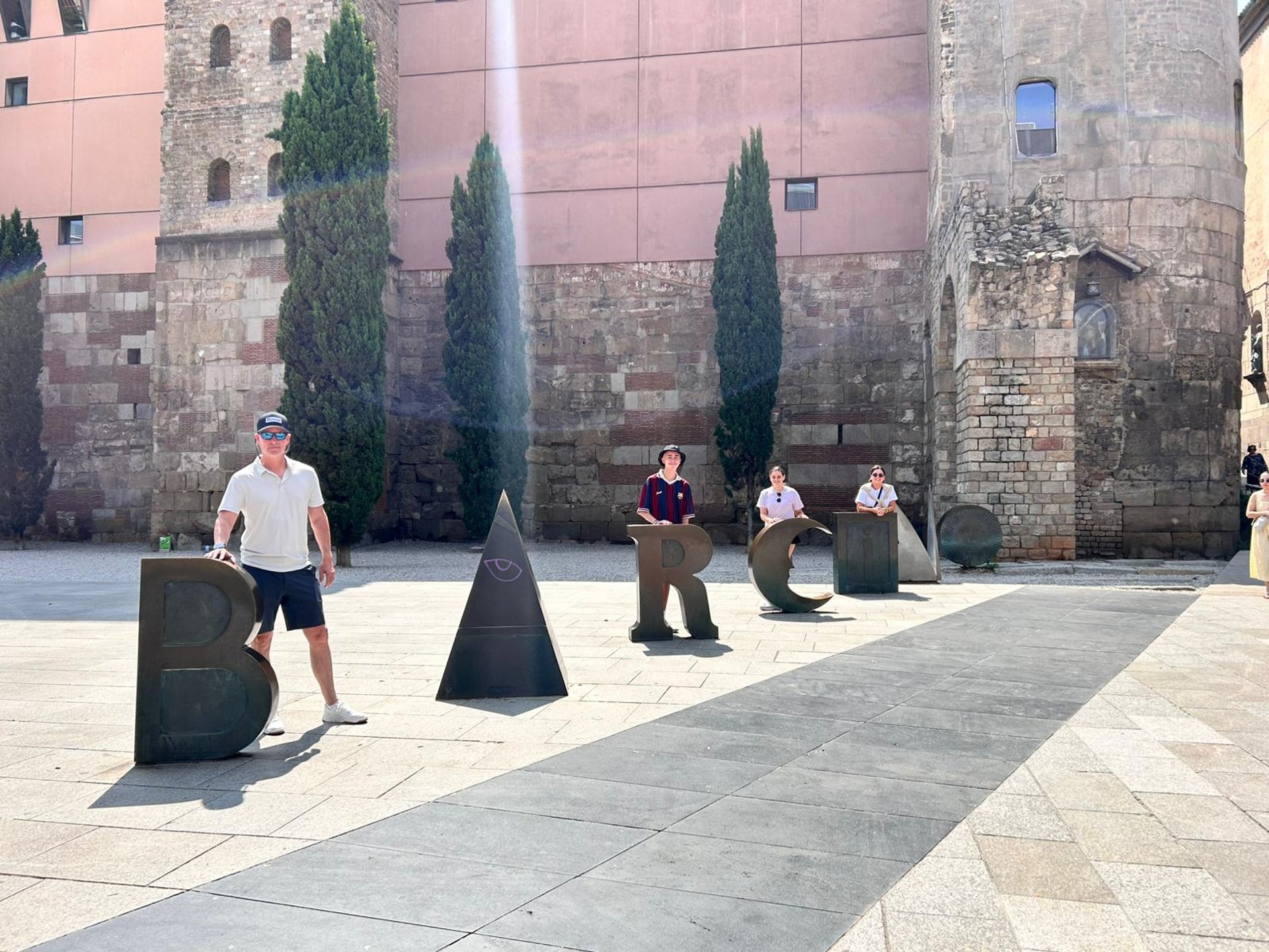 a large body of water with a city in the background