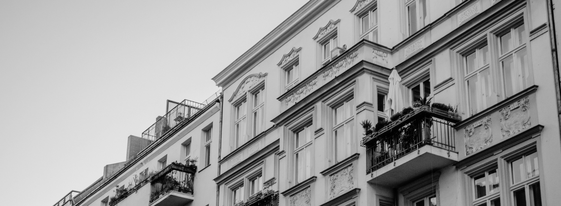 black and brown leather padded tub sofa