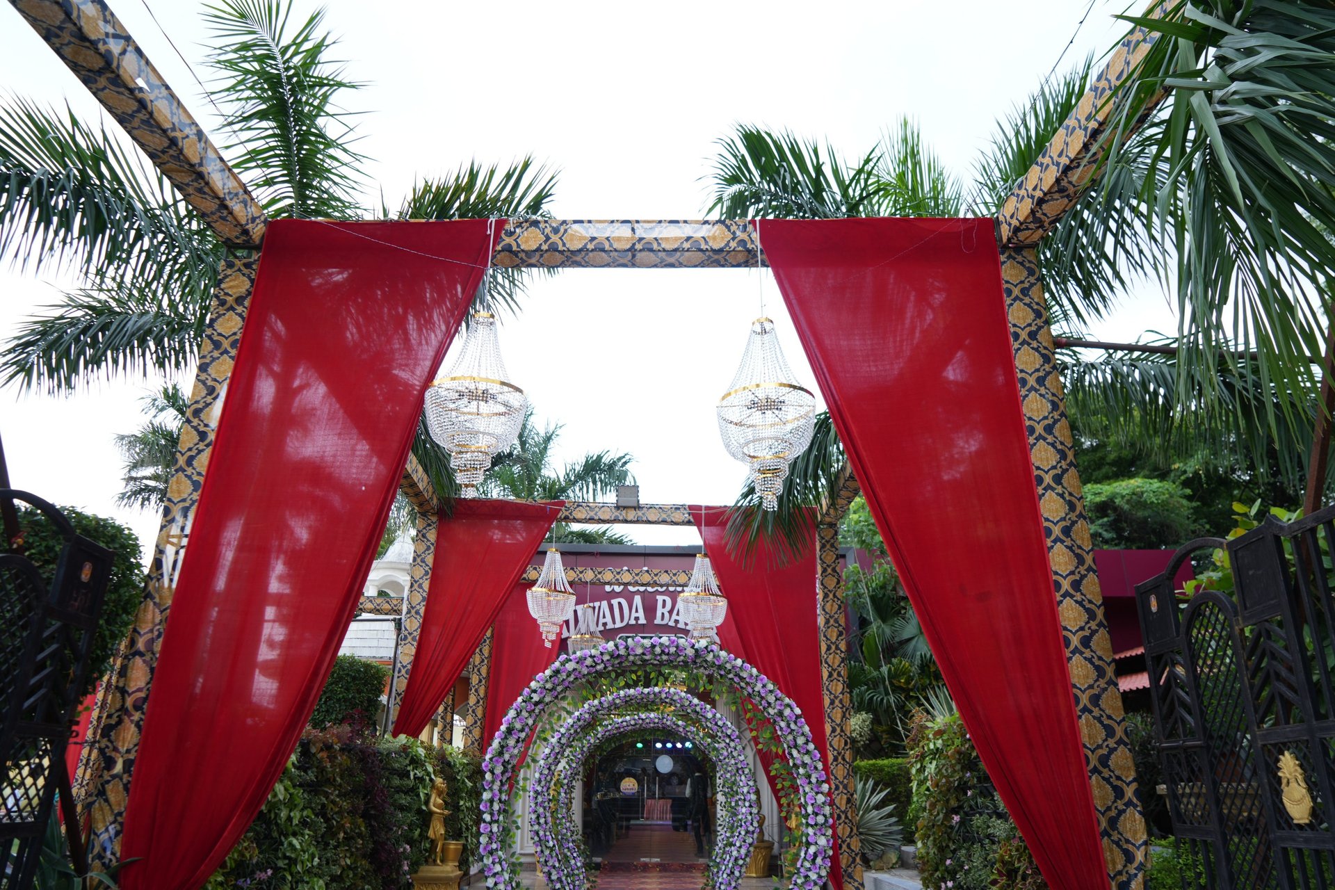black and white bed near brown wooden table
