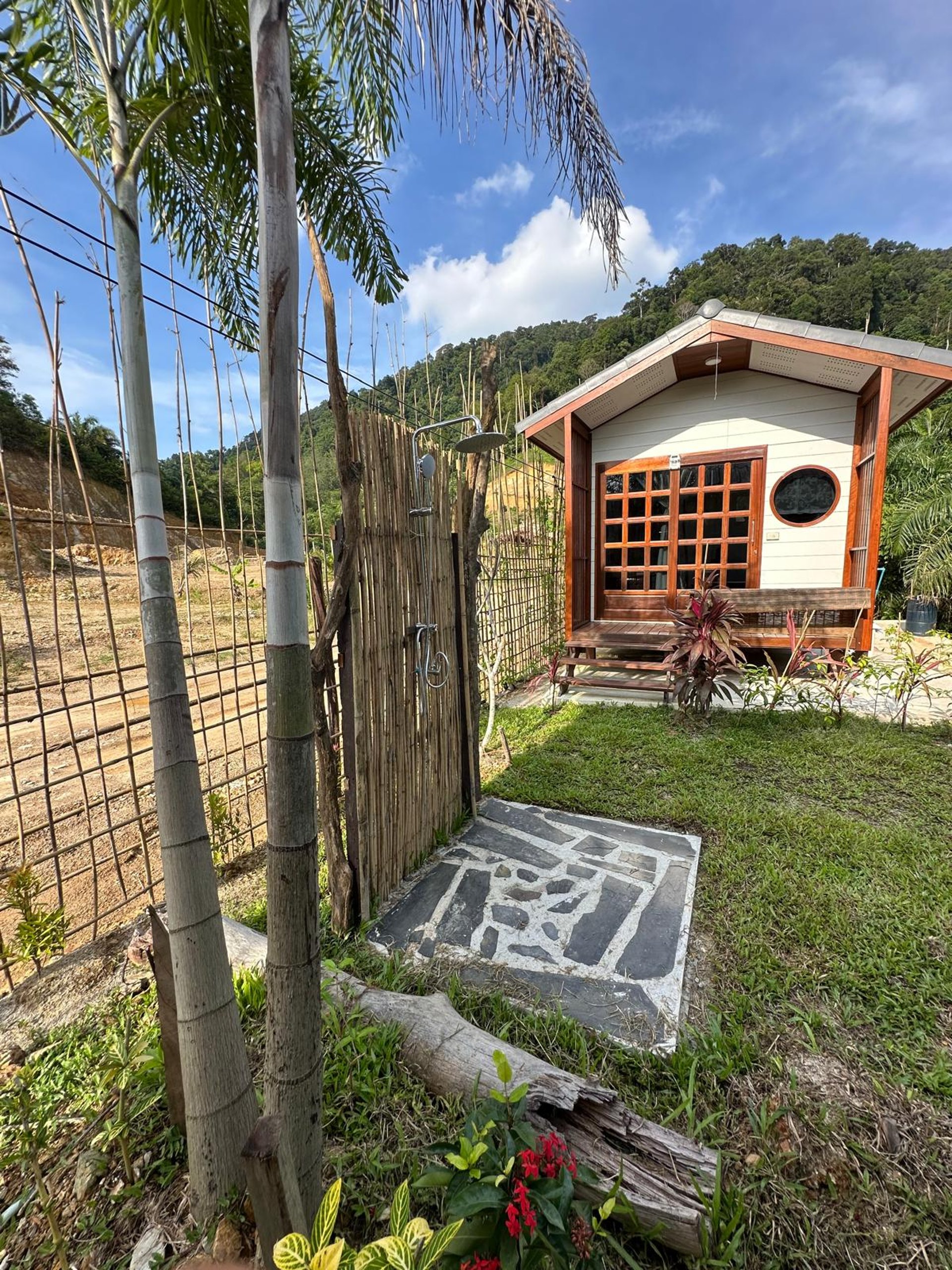 an abstract photo of a curved building with a blue sky in the background