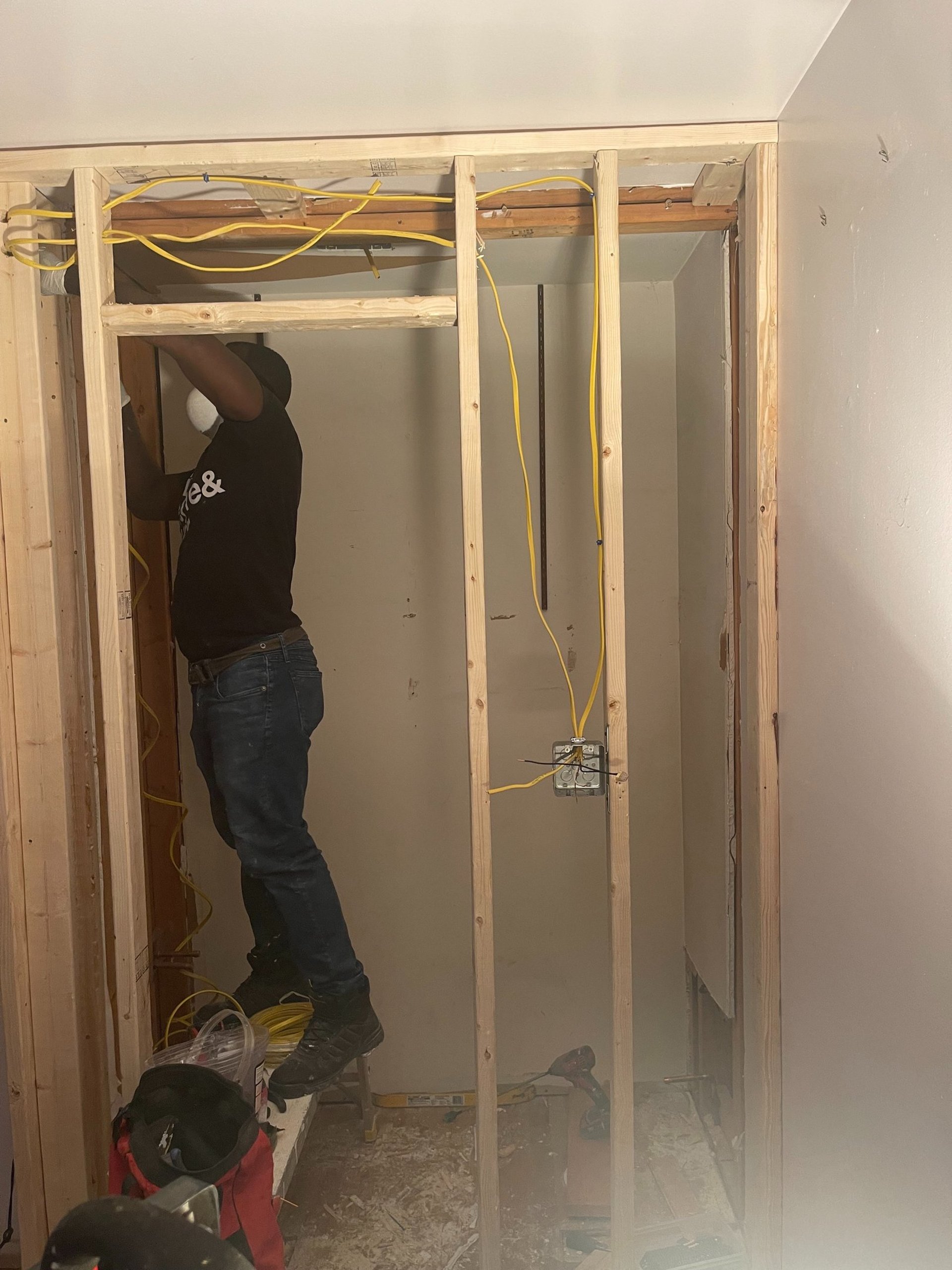 an abstract photo of a curved building with a blue sky in the background