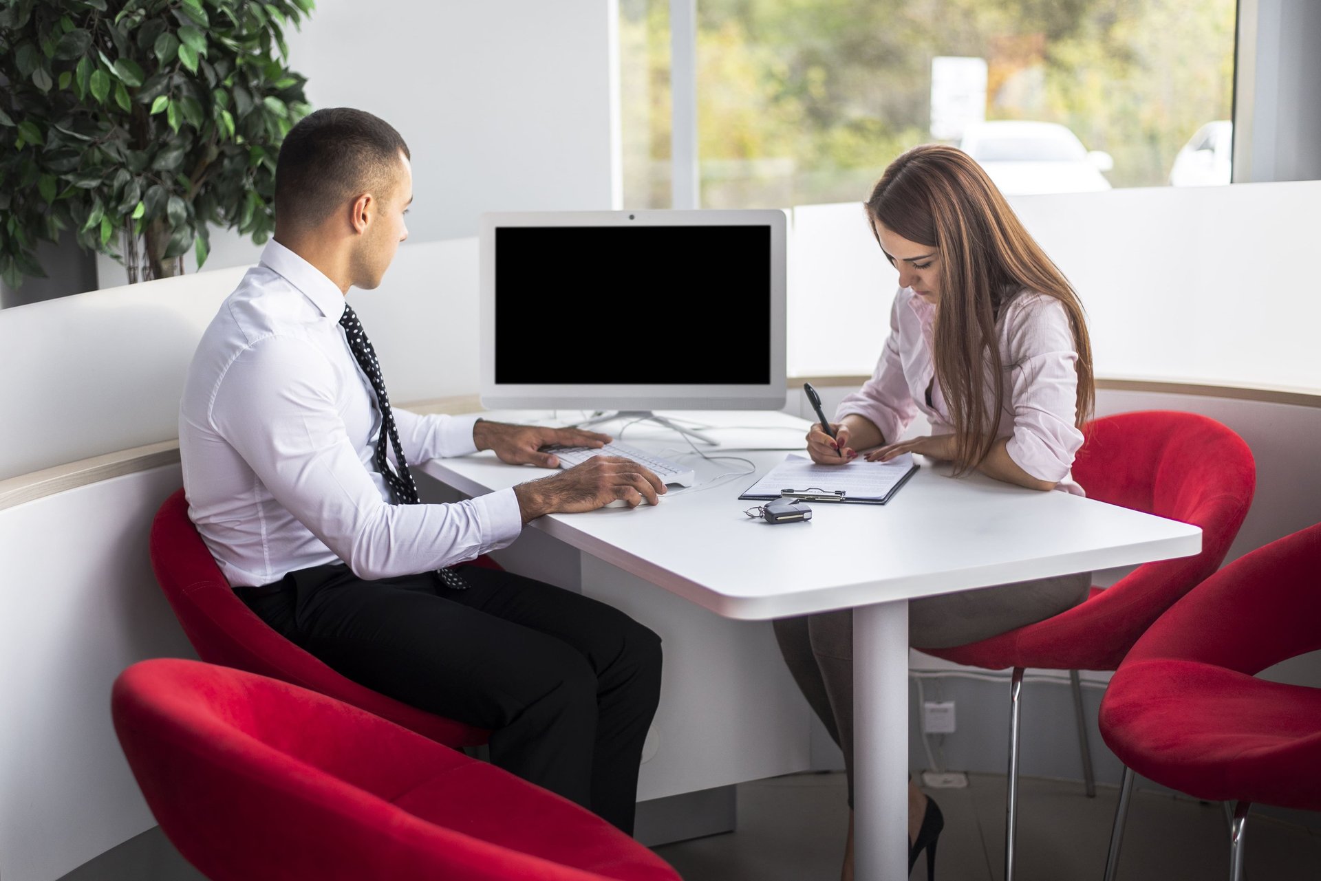 woman wearing yellow long-sleeved dress under white clouds and blue sky during daytime