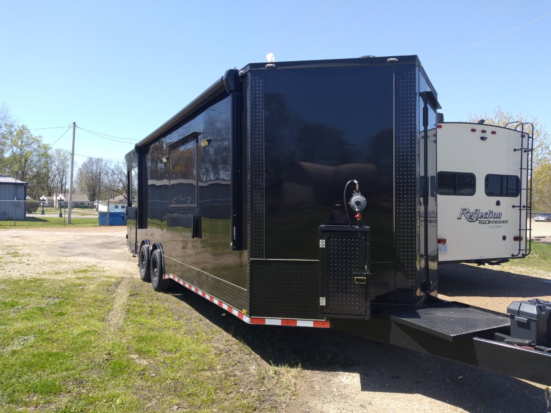 black and brown leather padded tub sofa