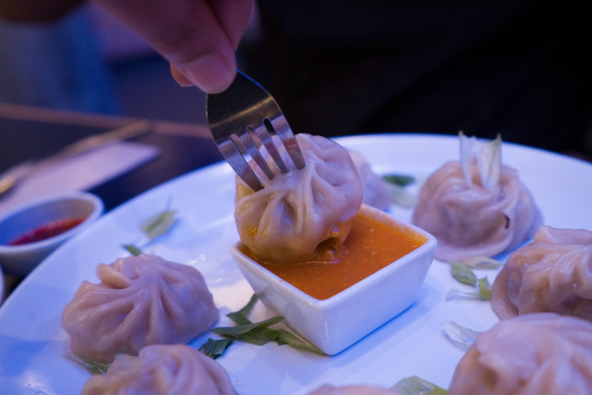 woman wearing yellow long-sleeved dress under white clouds and blue sky during daytime