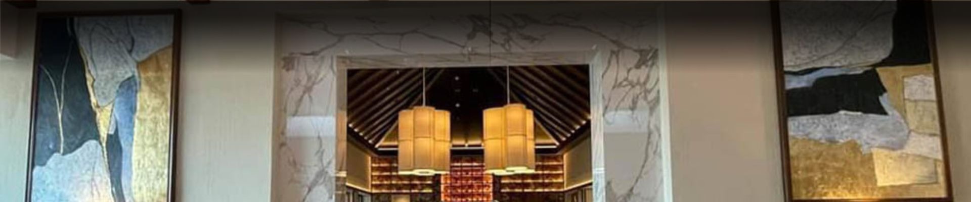 an abstract photo of a curved building with a blue sky in the background