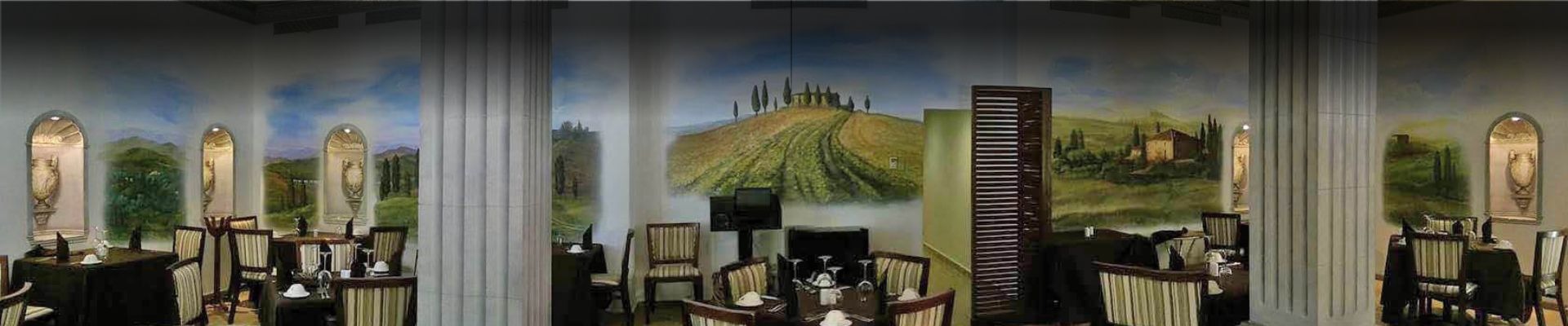 an abstract photo of a curved building with a blue sky in the background