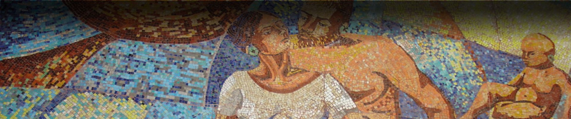 an abstract photo of a curved building with a blue sky in the background