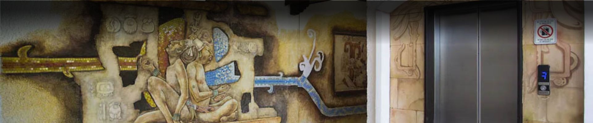 an abstract photo of a curved building with a blue sky in the background