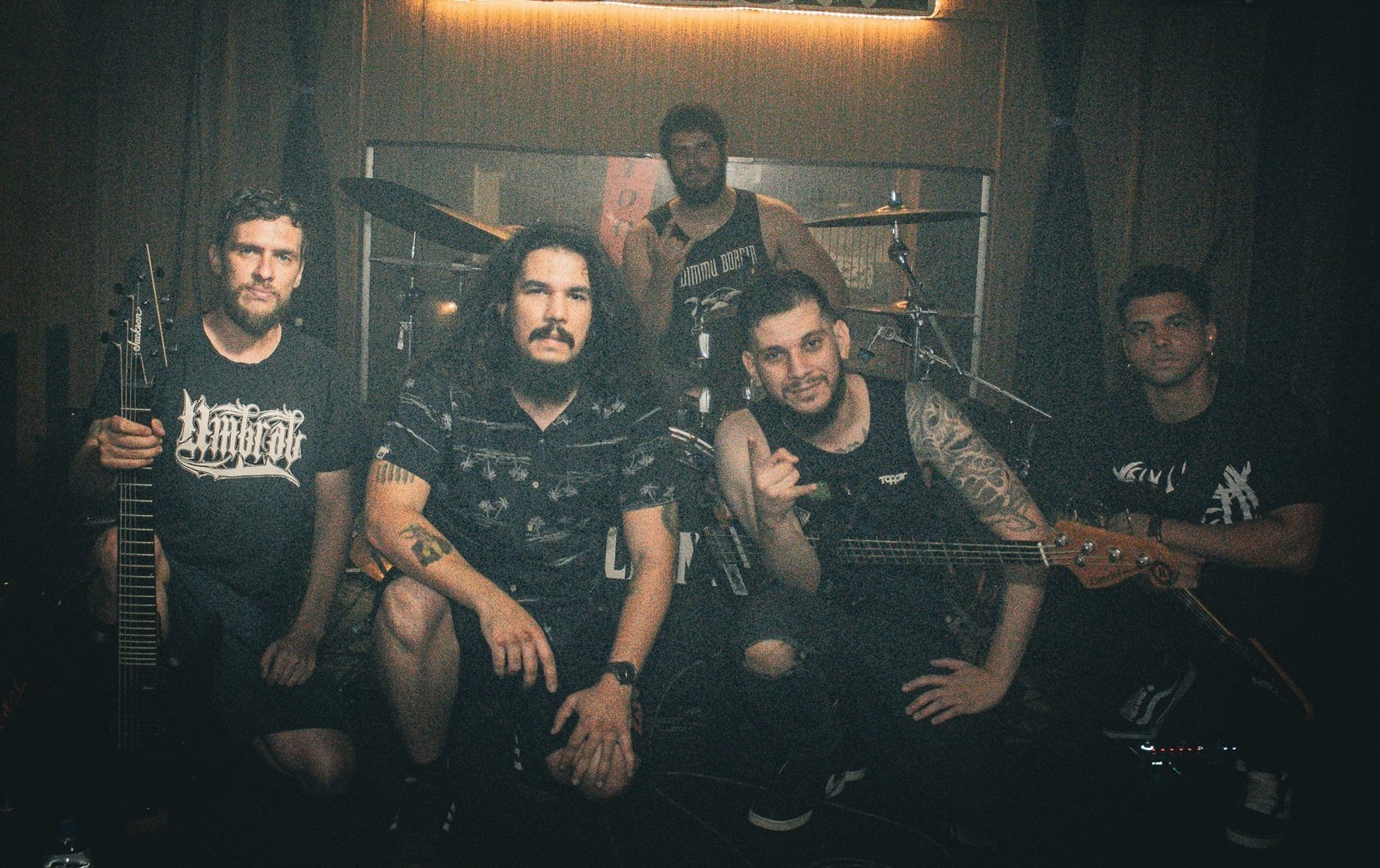 a man making a peace sign with his fingers