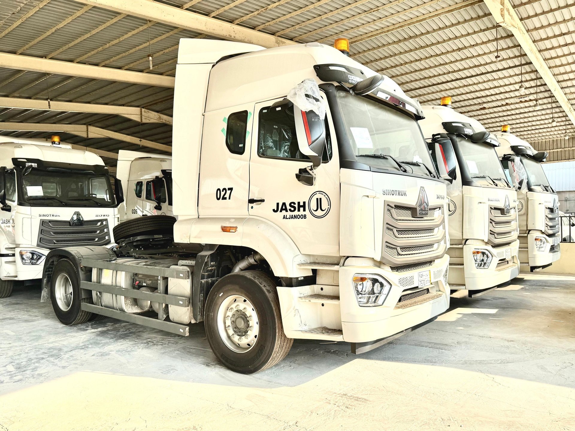 black and brown leather padded tub sofa
