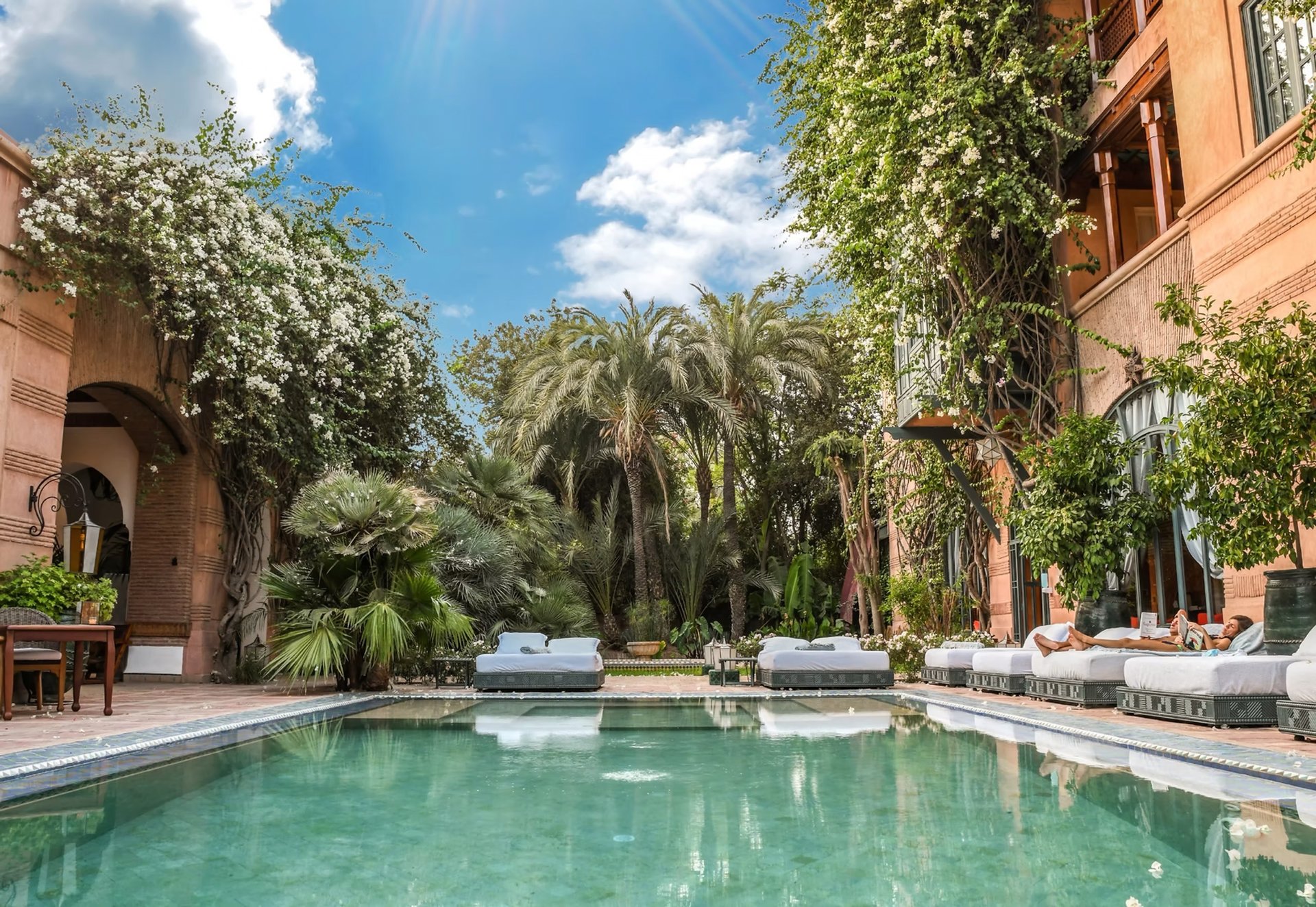 woman in white knit sweater inside aircraft