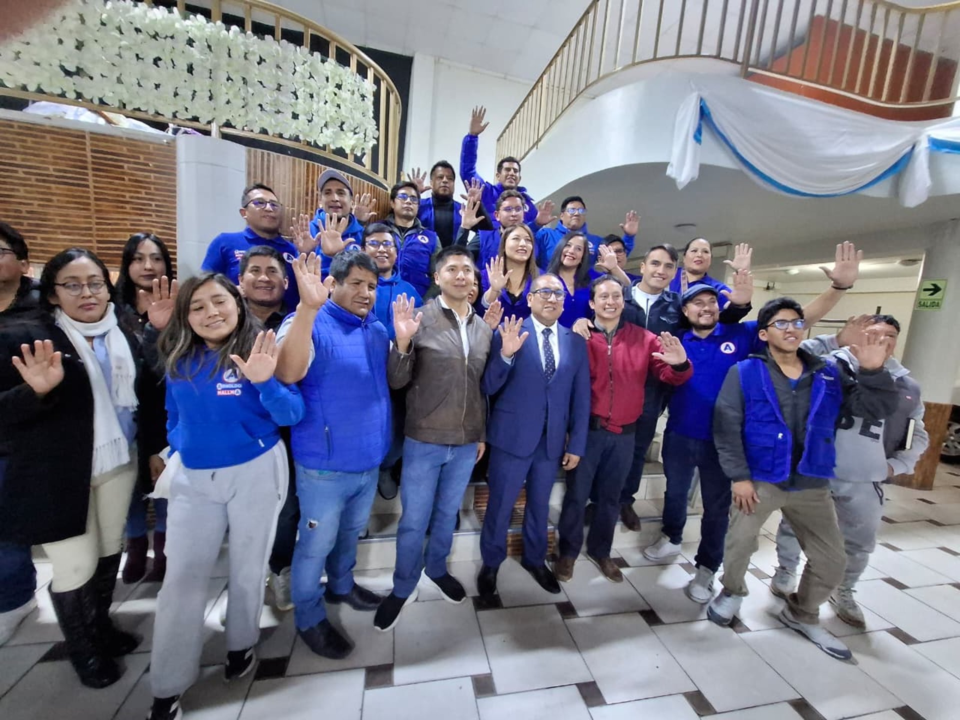 an abstract photo of a curved building with a blue sky in the background