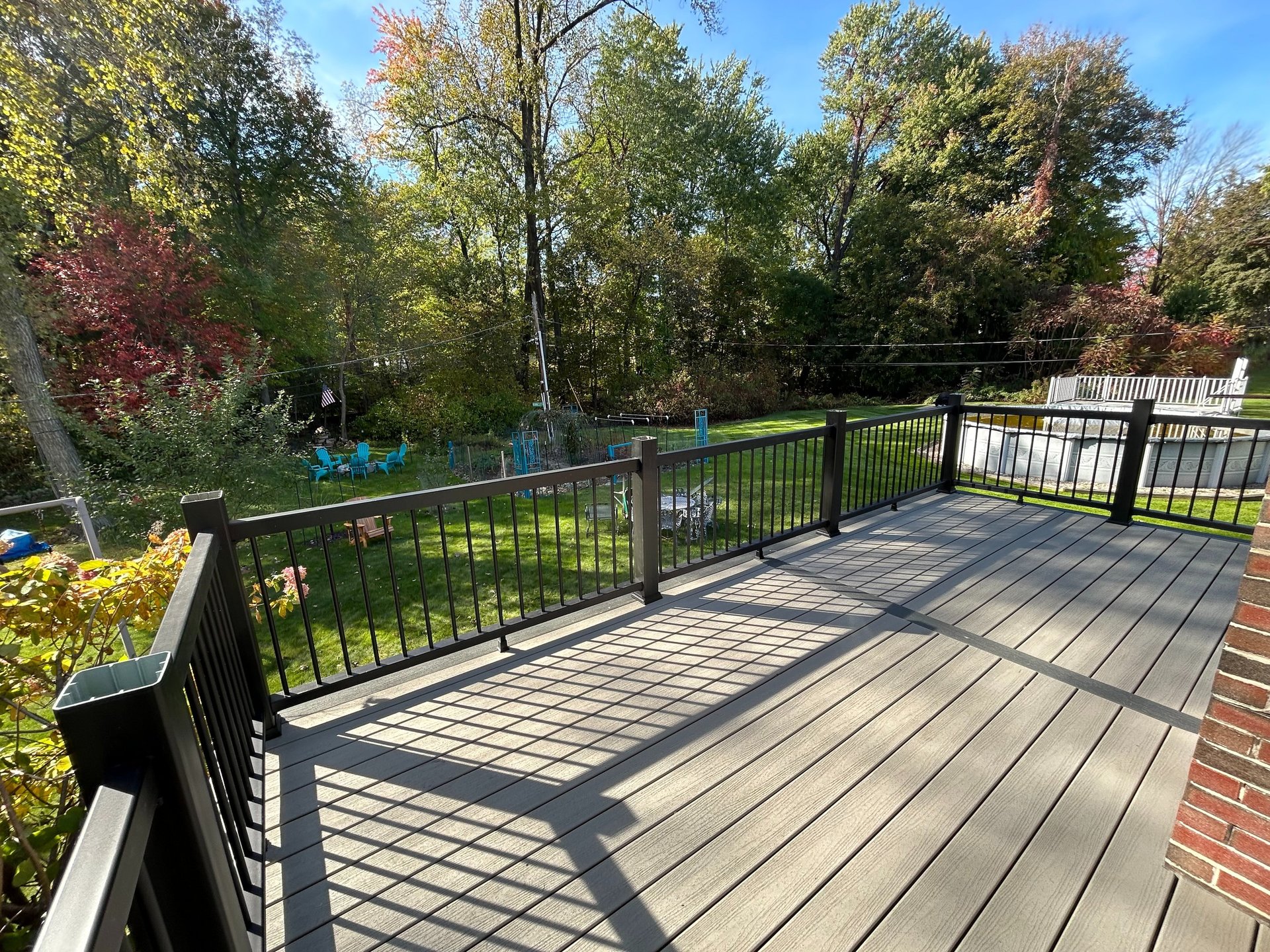black and brown leather padded tub sofa