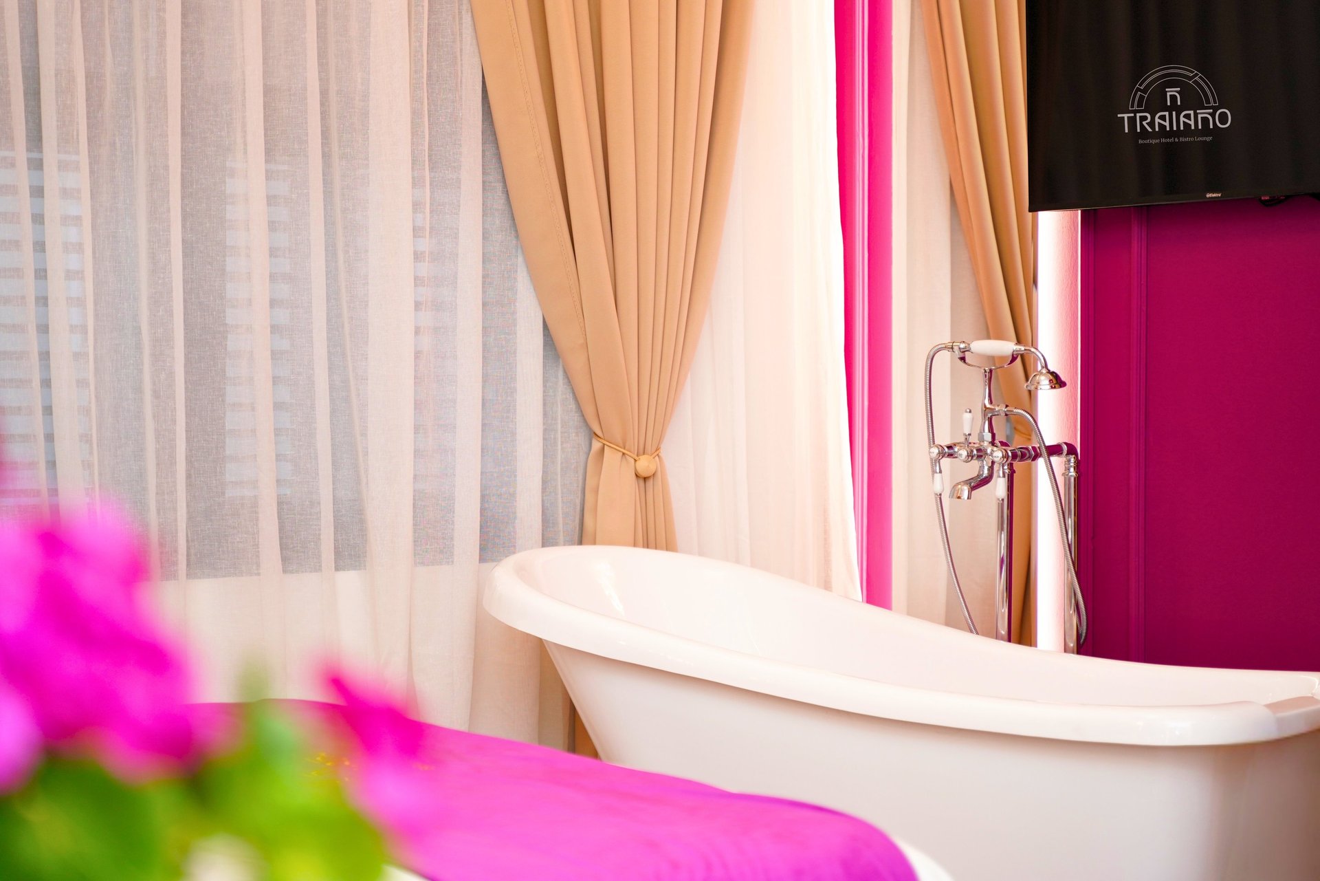 an abstract photo of a curved building with a blue sky in the background