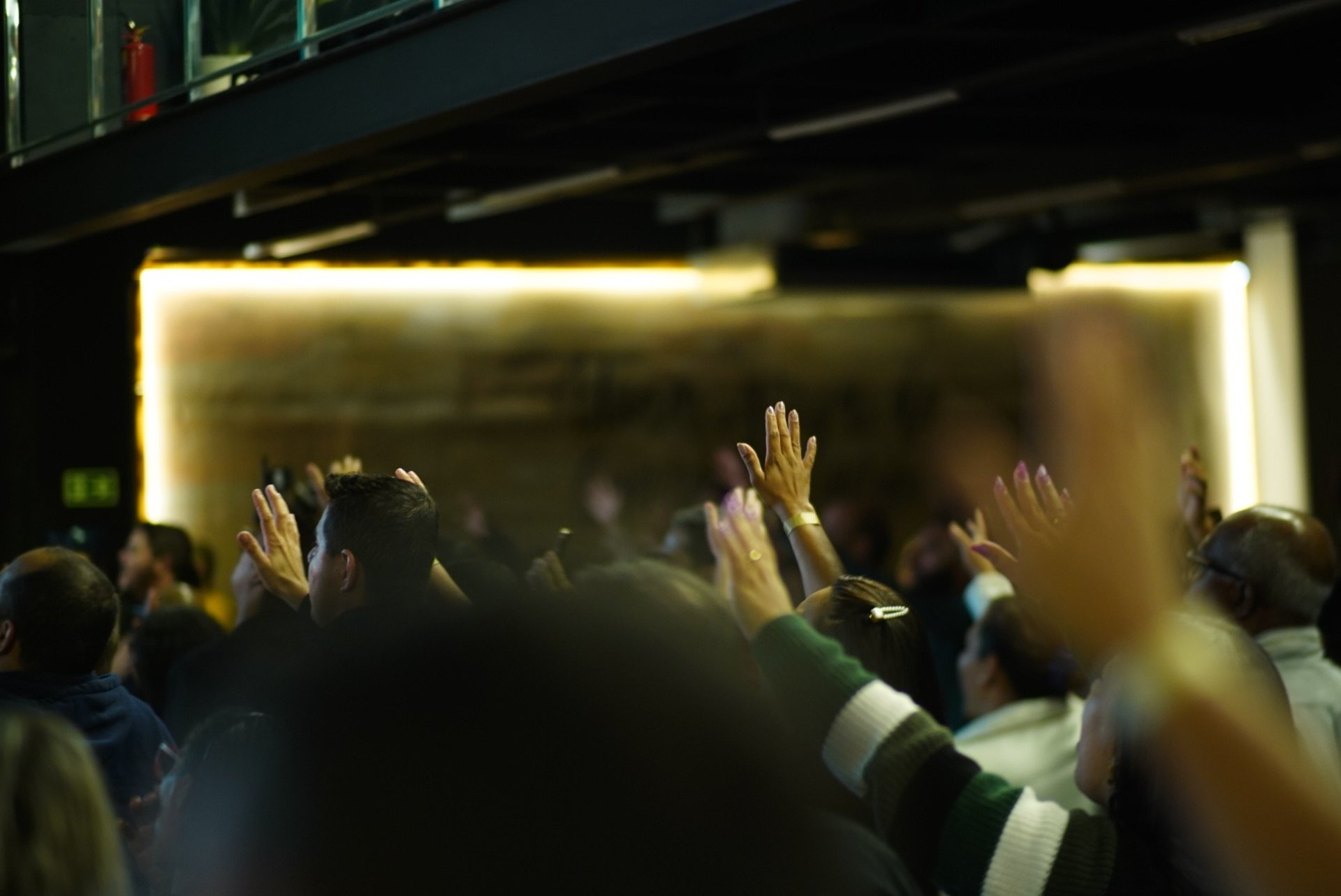 person wearing grey knit sweater