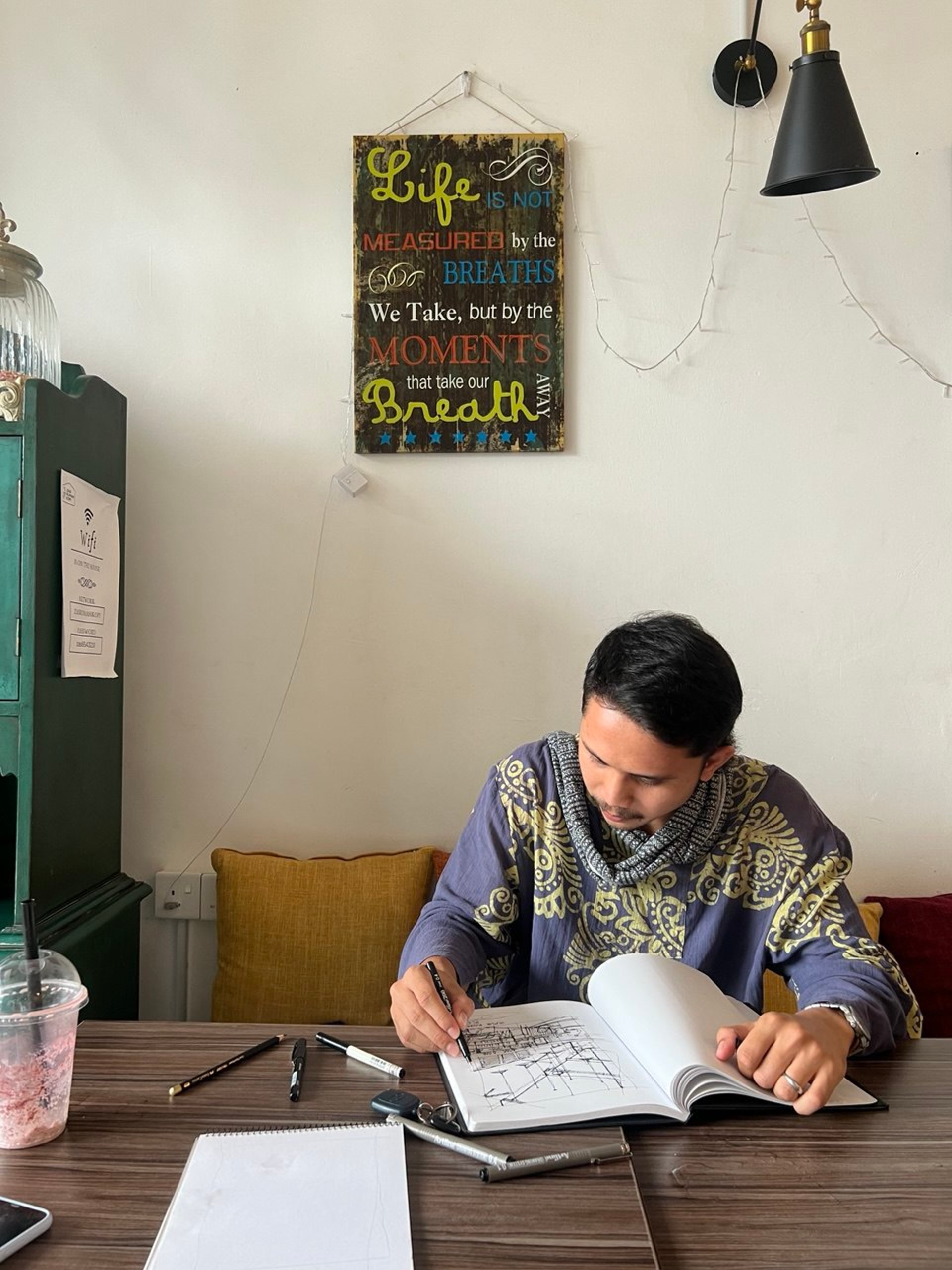an abstract photo of a curved building with a blue sky in the background