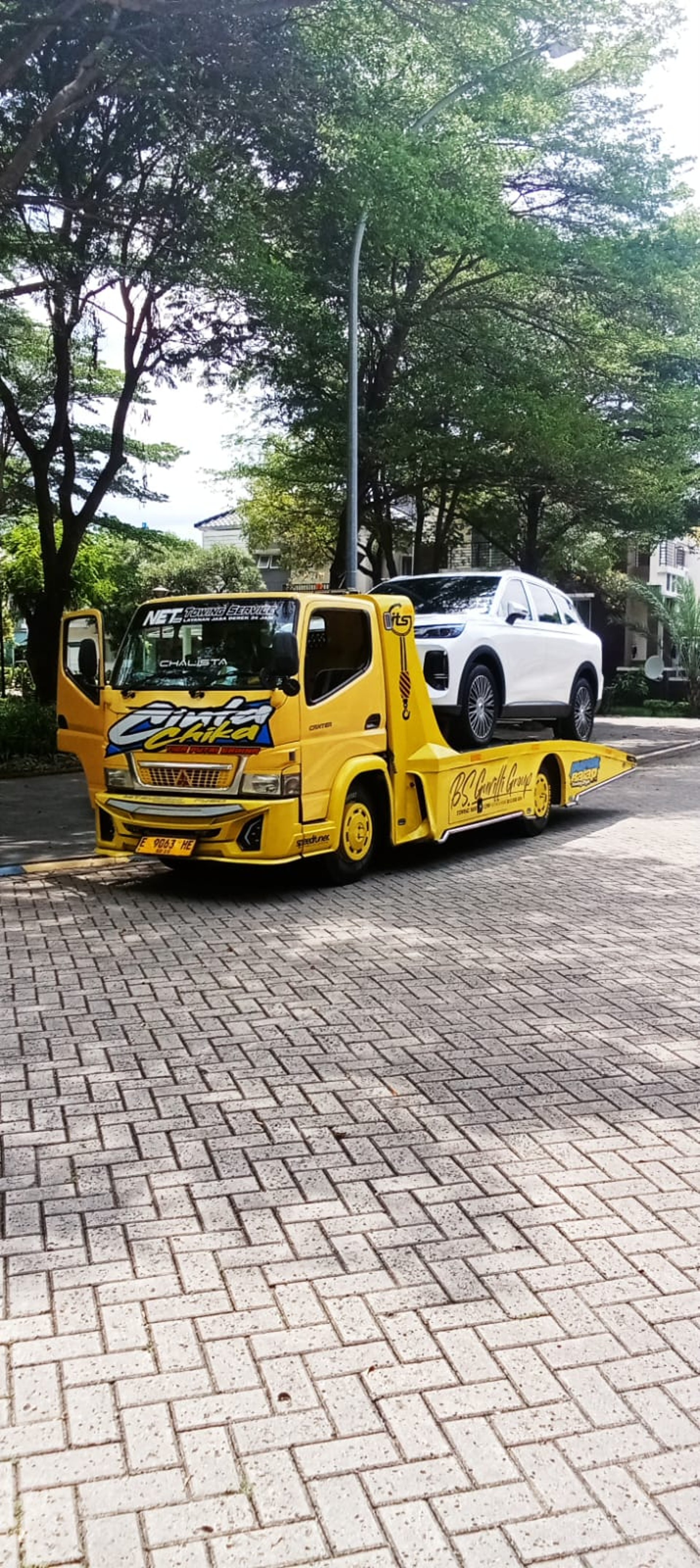 black and brown leather padded tub sofa