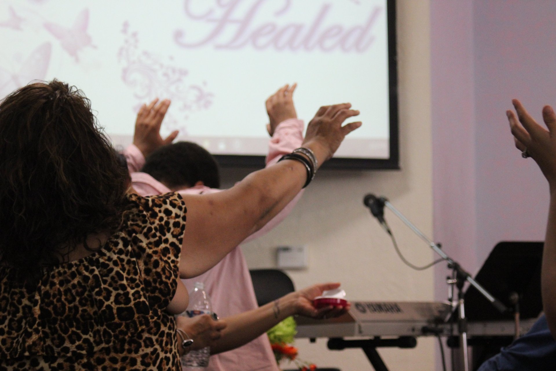 an abstract photo of a curved building with a blue sky in the background
